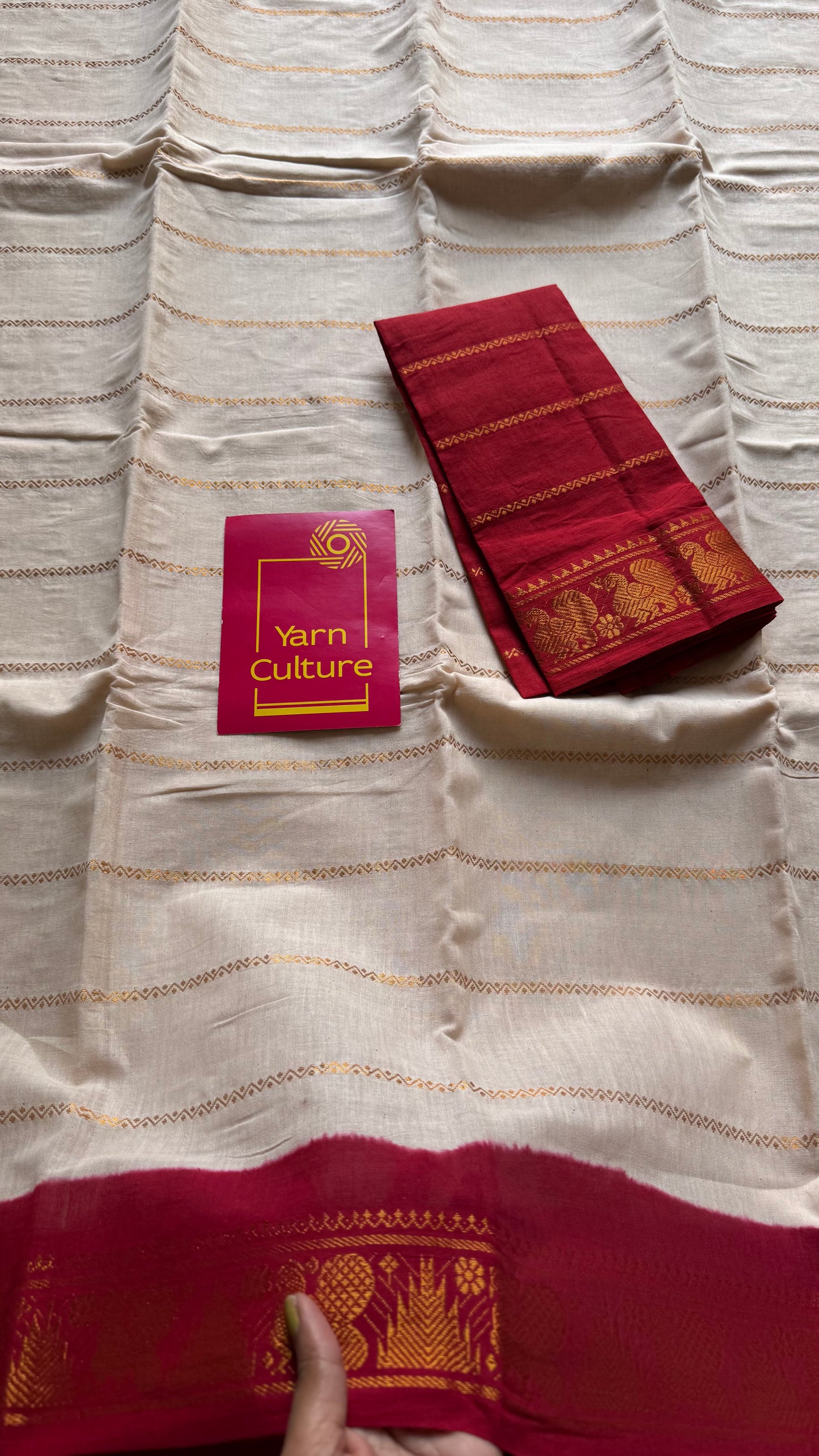 Cream velthaari patterned kattuchayam dyed madurai cotton saree with red peacock border - YCCOTNMSFE277