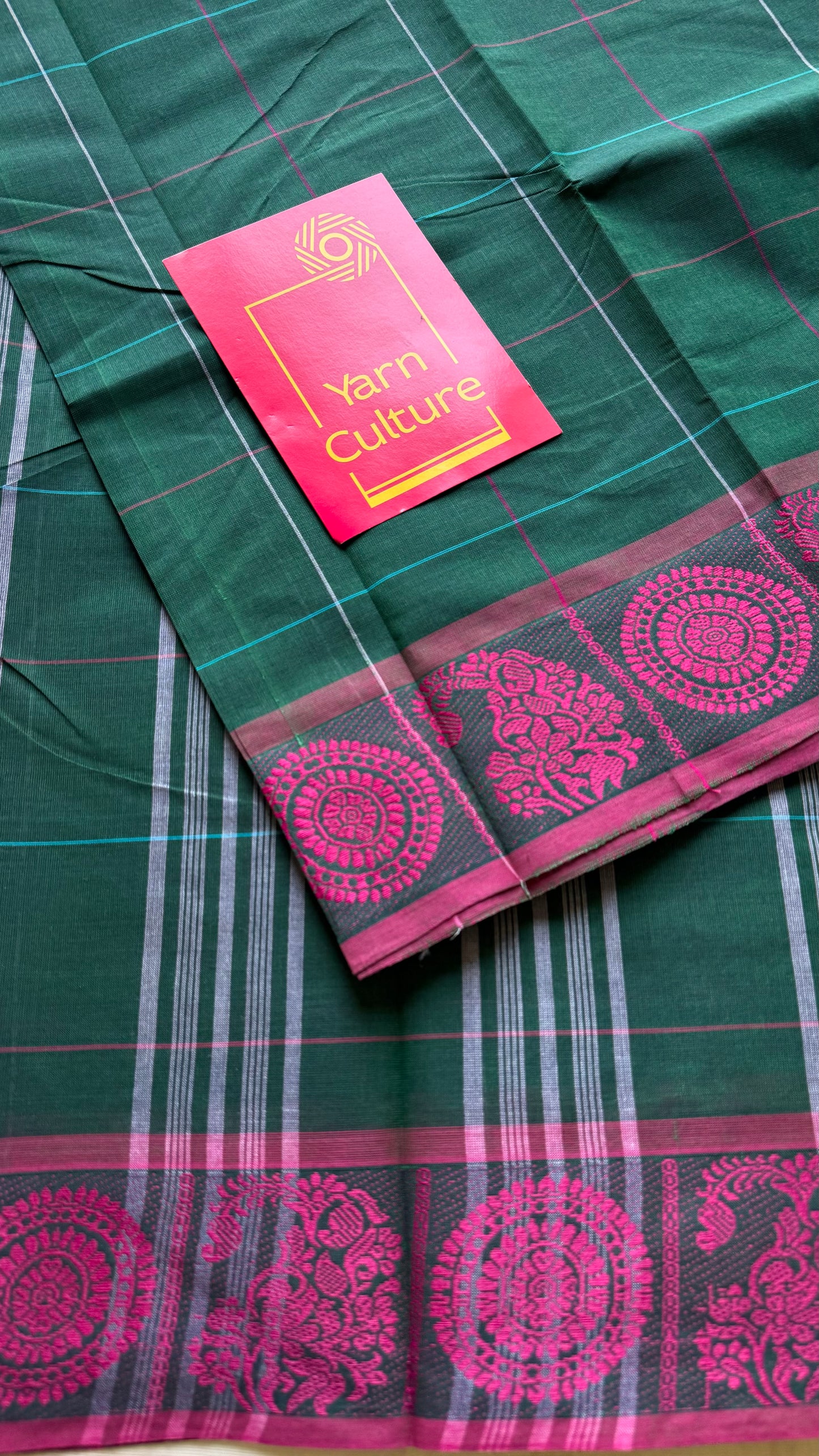 Chettinad cotton saree in dark green with pink checks, thread motif border - YCCOTNJUCC05