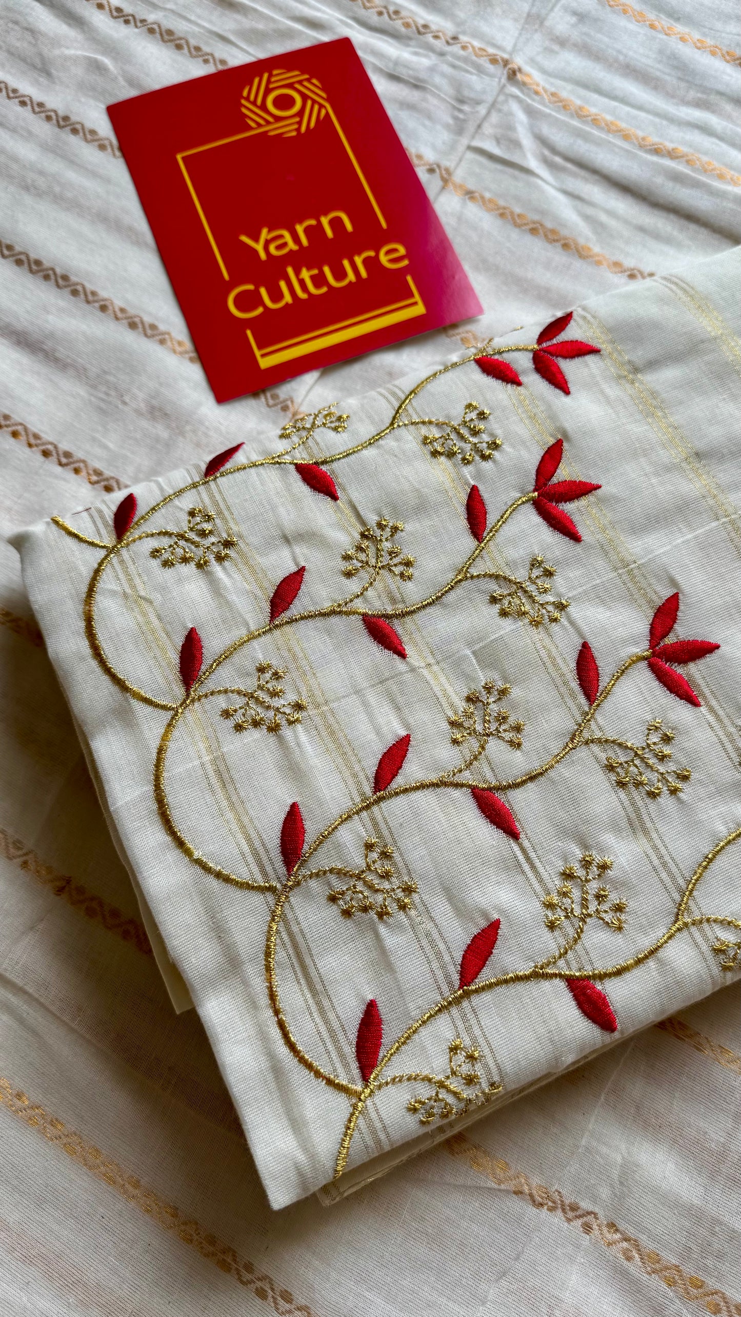 Ivory and gold soft cotton saree, red floral vine embroidery - YCIEON60