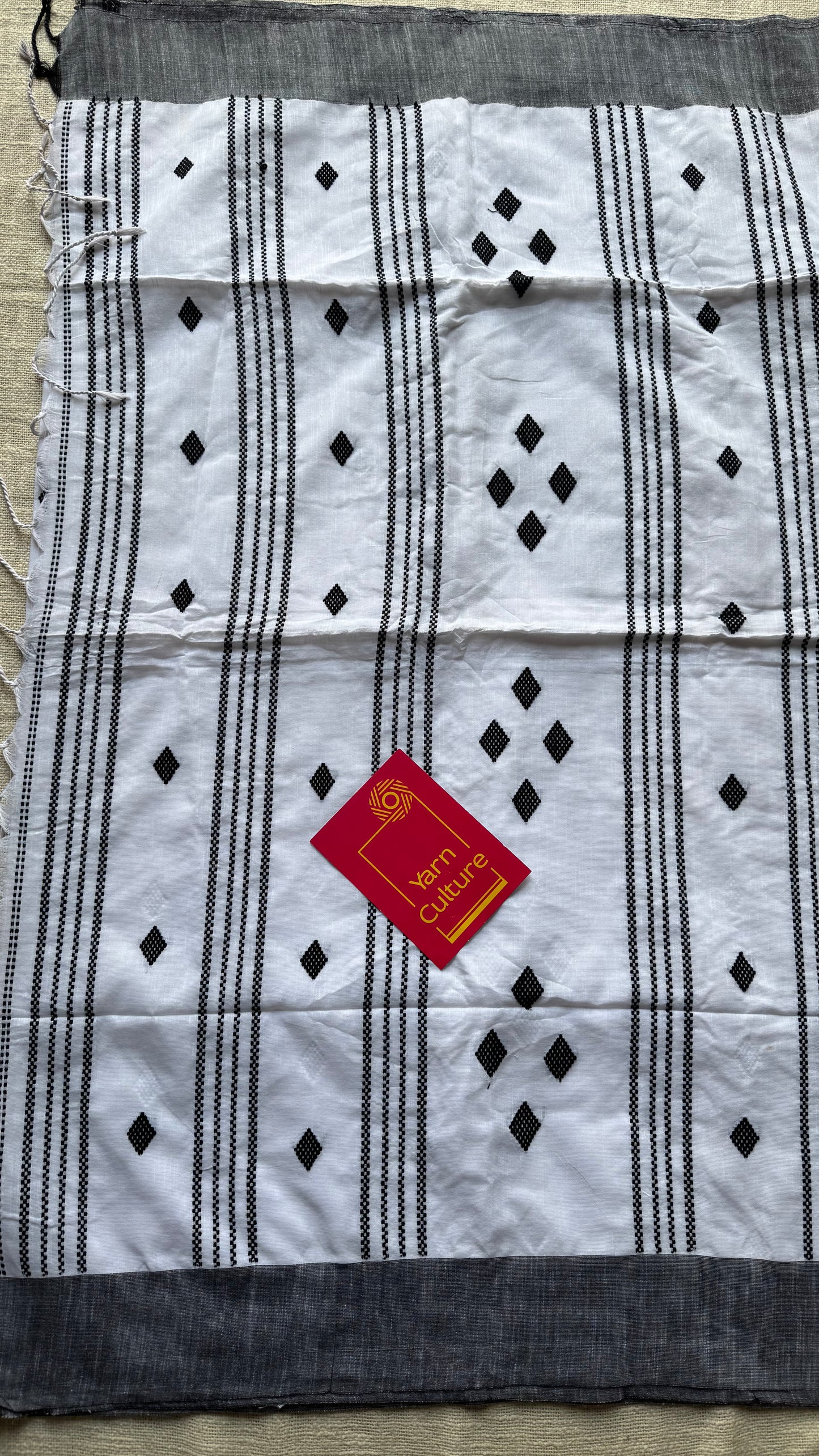 White with black, soft khadi cotton with woven motifs - YCBCKCDE23