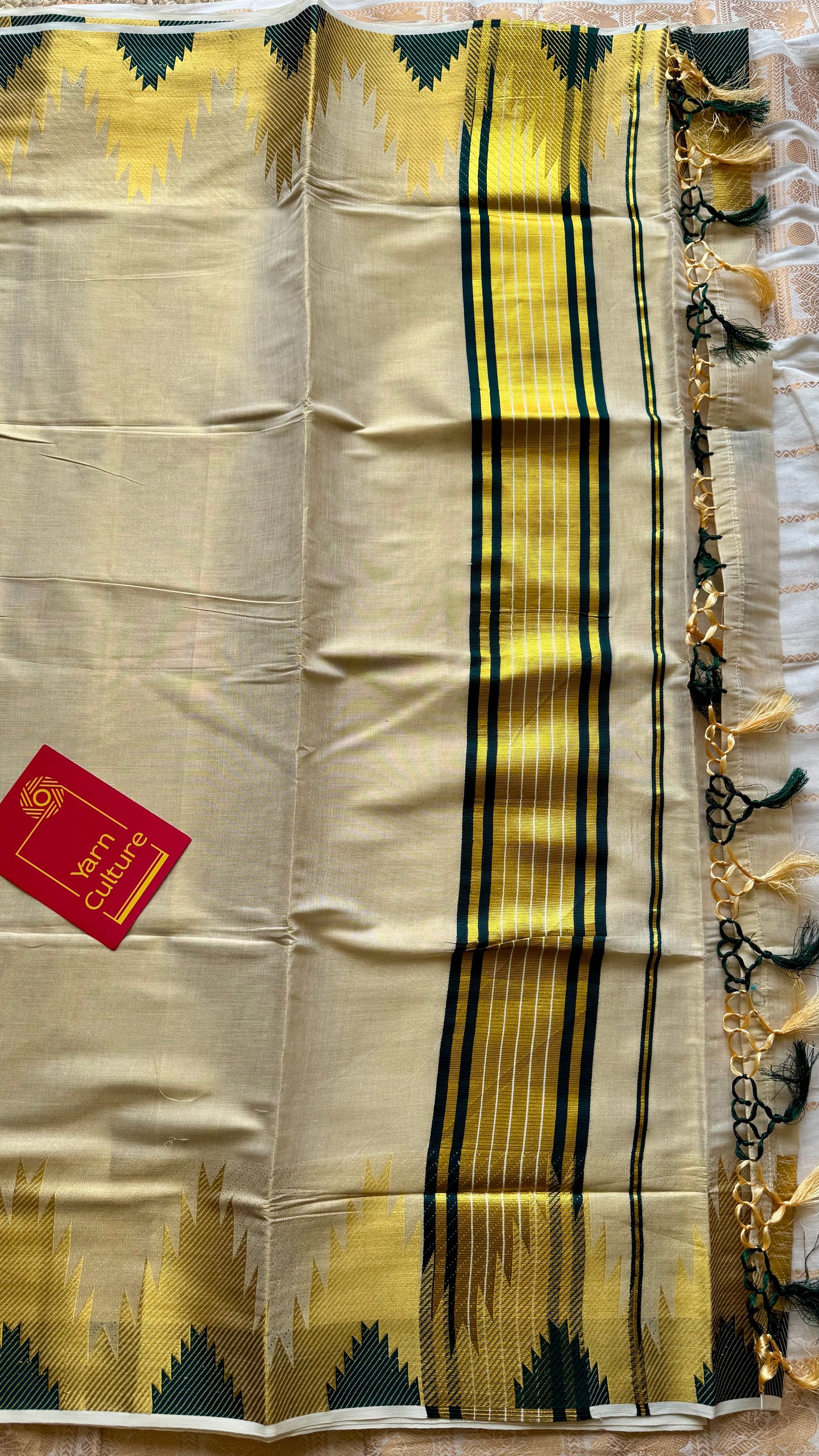 Ivory and gold kerala kasavu saree, dark green temple border - YCIEON47