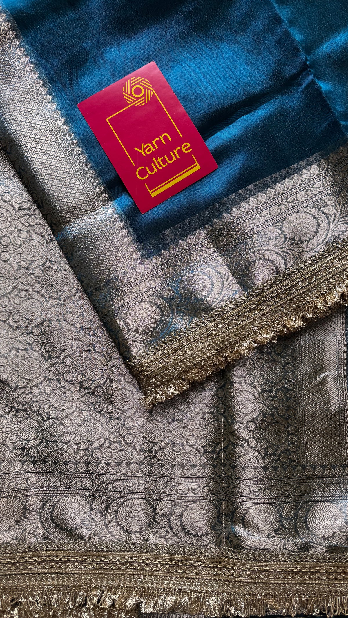 Peacock blue tissue Banarasi saree with embellished gold lace border - YCBLTOC77