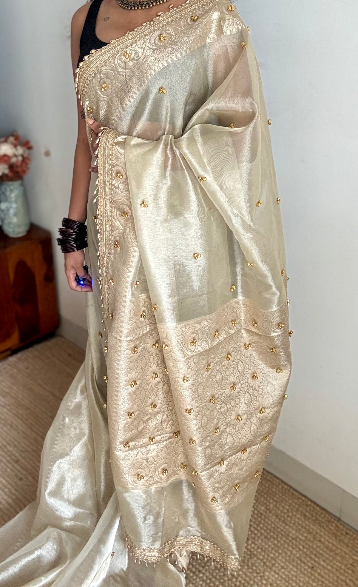 Ivory gold tissue Banarasi saree with ghungroo embellishments and beaded lace zari border - YCBLTOC70