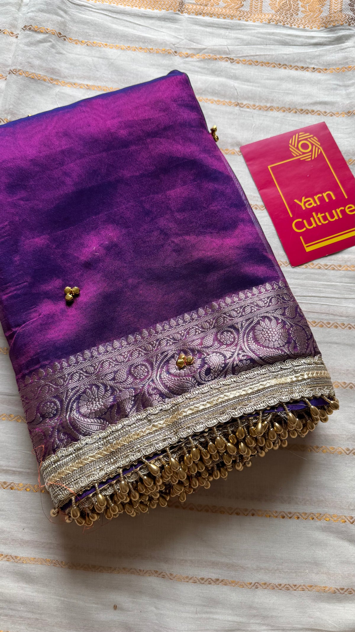 Purple gold tissue Banarasi saree with ghungroo embellishments and beaded lace border - YCBLTOC67