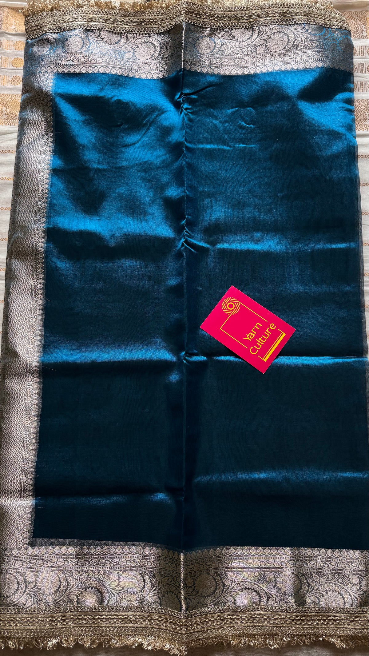 Peacock blue tissue Banarasi saree with embellished gold lace border - YCBLTOC77