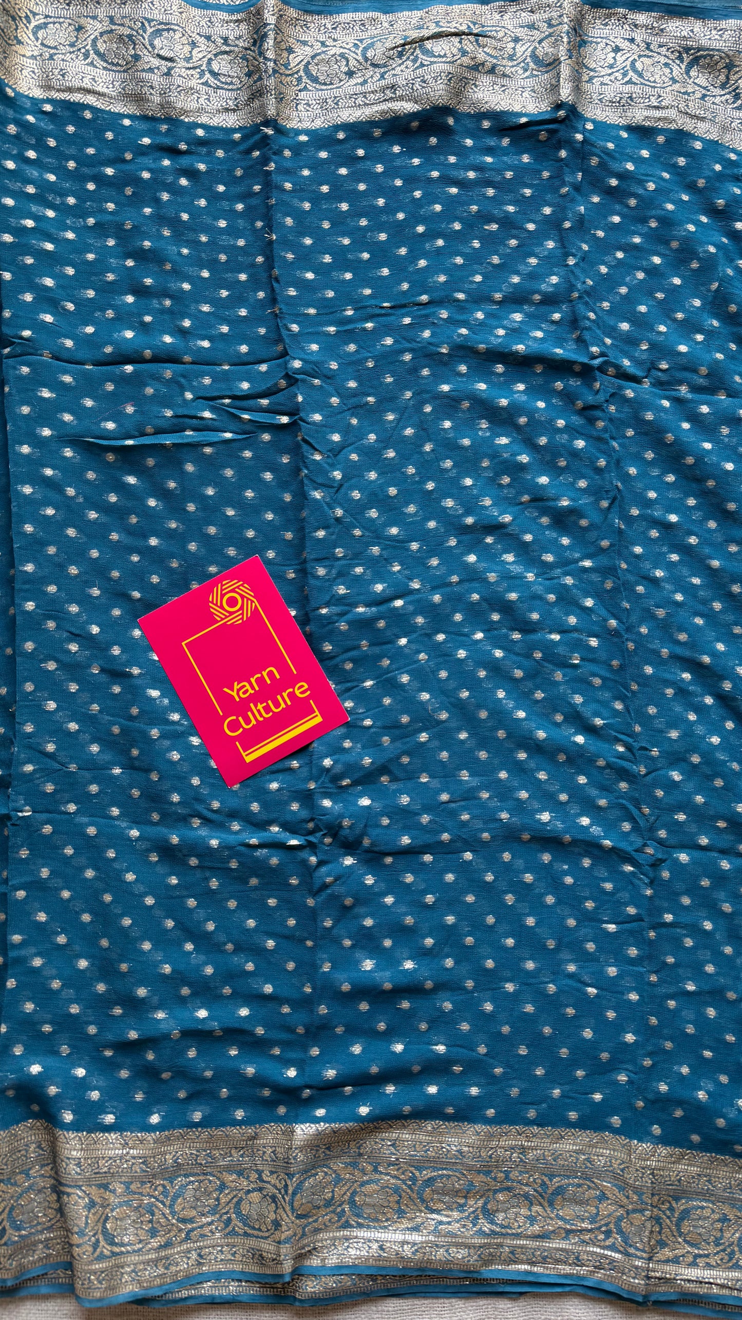 Peacock blue viscose georgette saree with zari motifs - YCDOSFE209