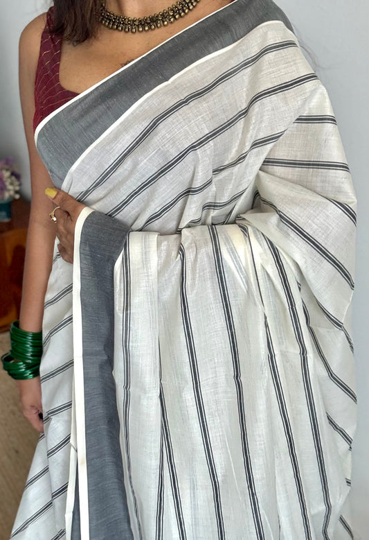 Ivory Kerala cotton saree with black stripes and border - YCIEKCFE321