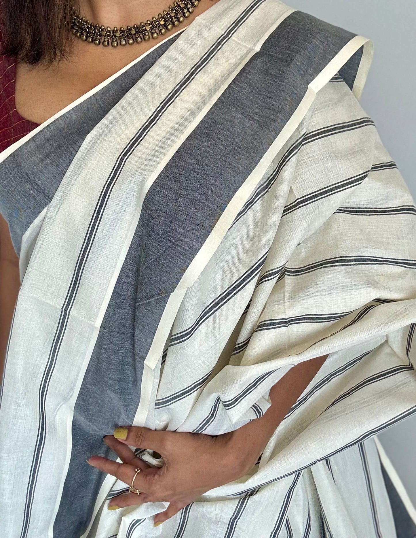 Ivory Kerala cotton saree with black stripes and border - YCIEKCFE321