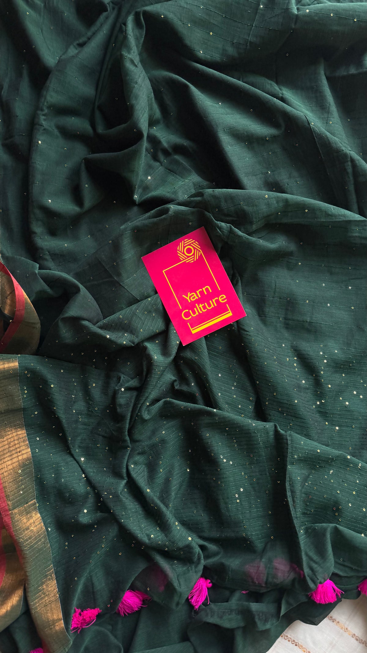 Dark green mul cotton saree with sequins and zari border - YCBCMCSE32
