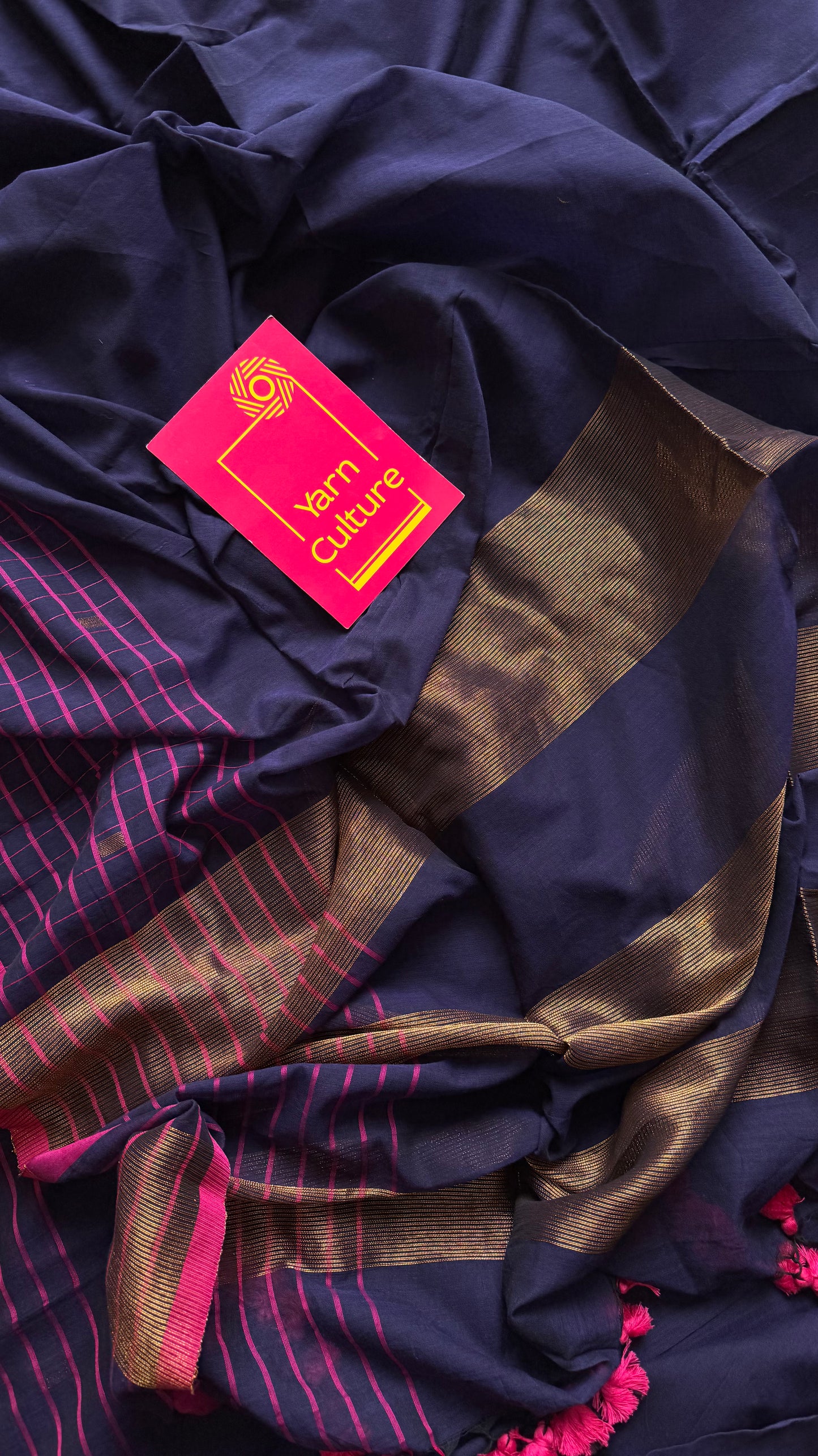 Navy handloom mul saree with hot pink checkered borders and antique gold buttas - YCBCMCFE386