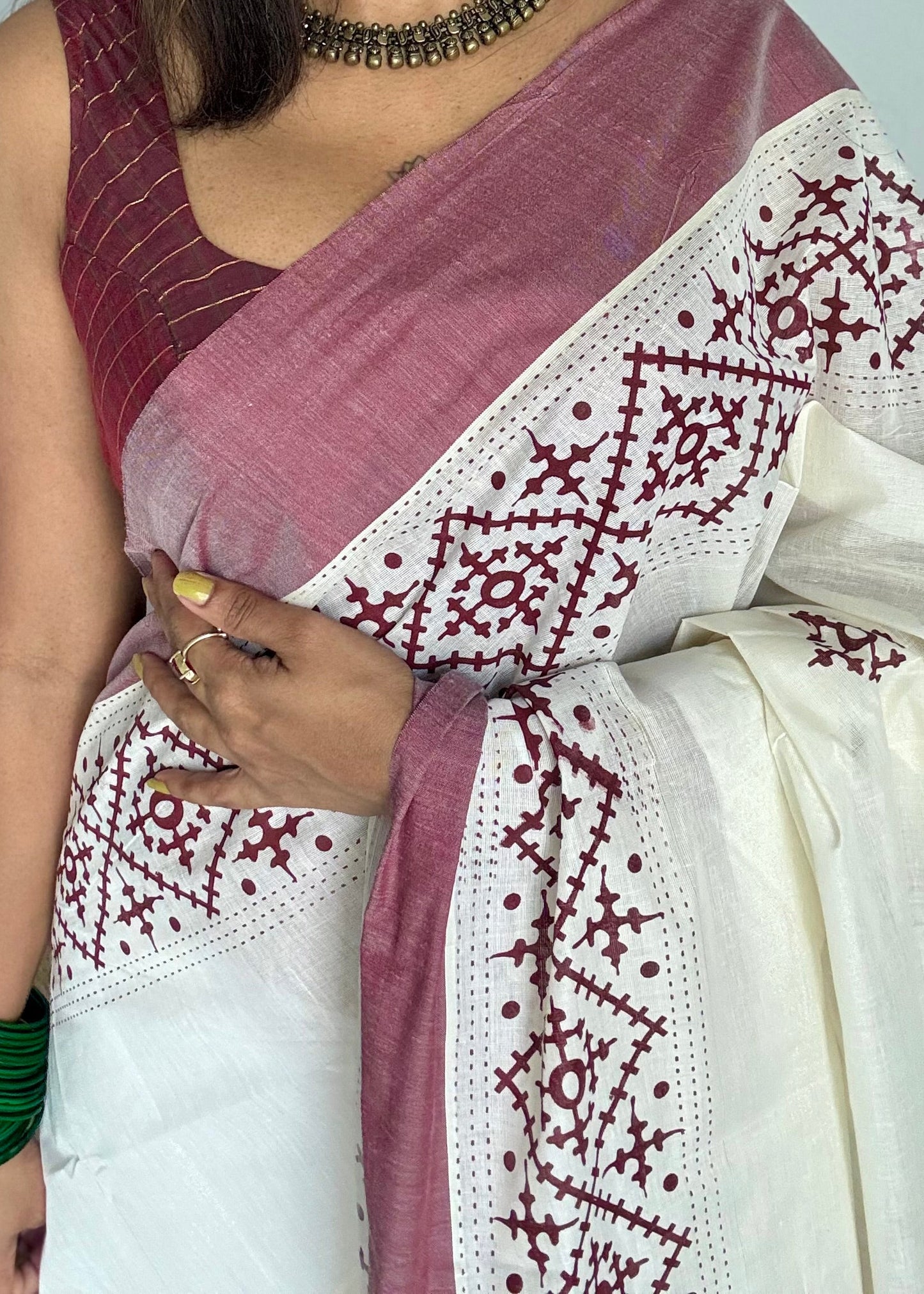 Ivory Kerala cotton saree with maroon Kutch-inspired printed borders and maroon centre pleats - YCIEKCFE313