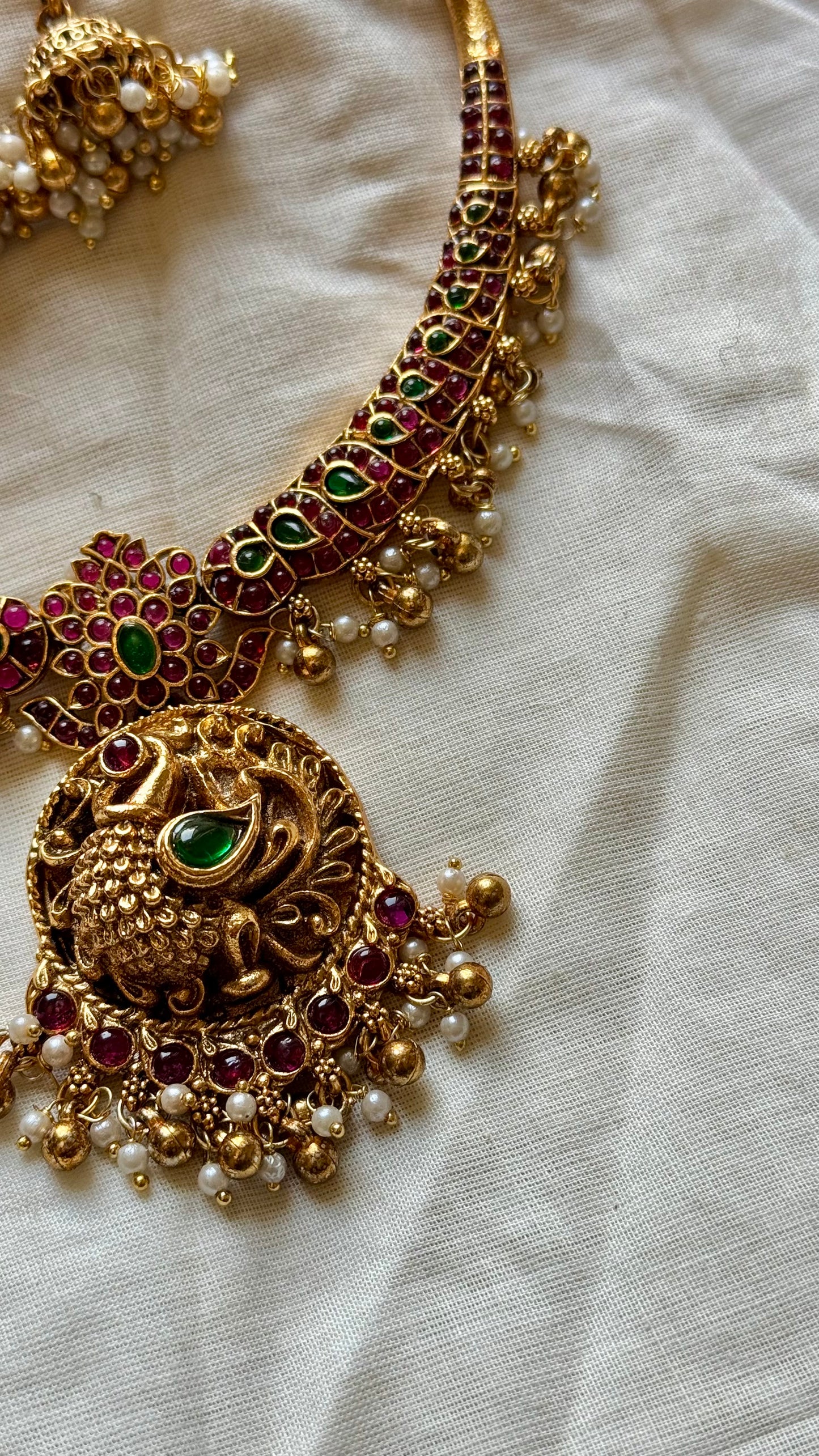 Kemp stones, peacock pendant necklace with jhumkas - YCGPNP469