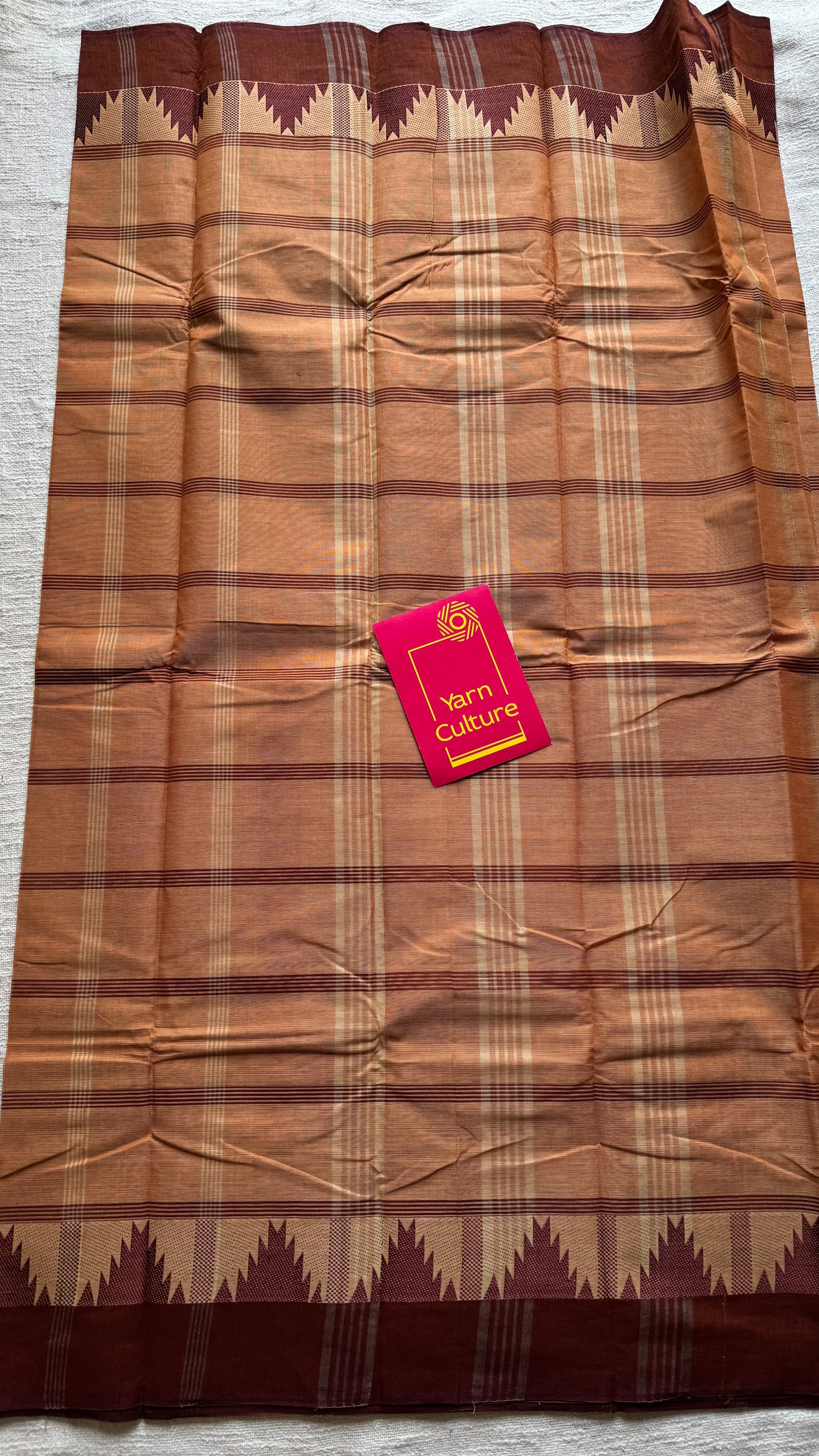 Chettinad cotton saree with light brown and dark brown checks, temple motif border - YCCOTNAP71