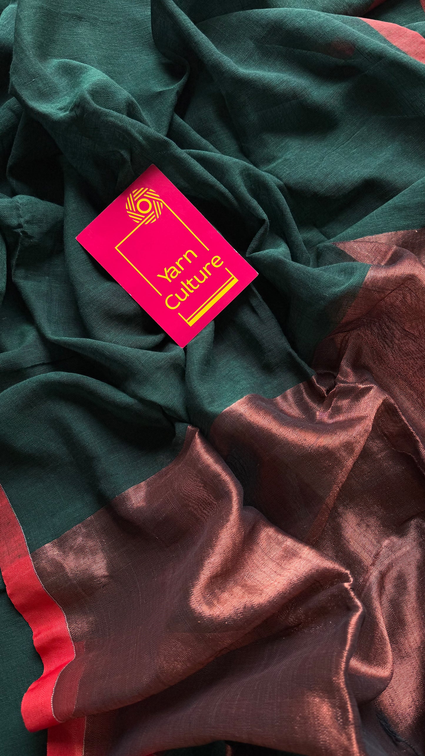 Dark green plain linen by cotton saree with copper zari pallu - YCBCLCFE397