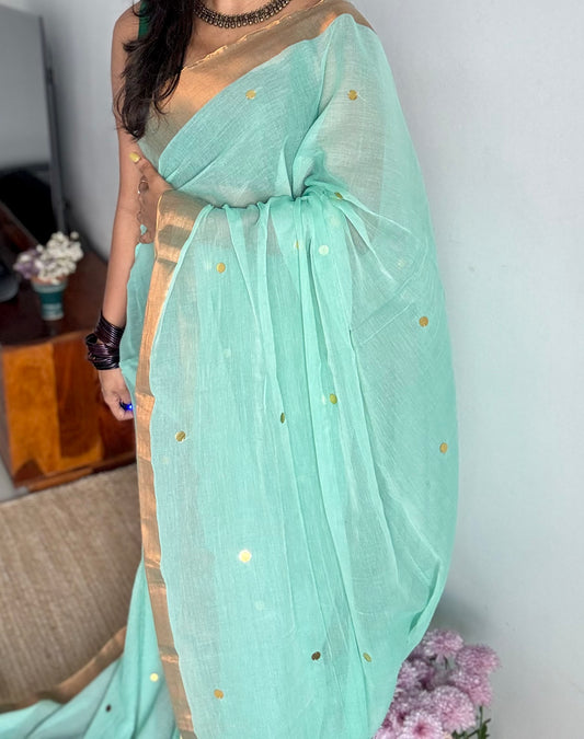 Pastel sea green mul with gini sequins and copper zari border - YCBCMCNO61