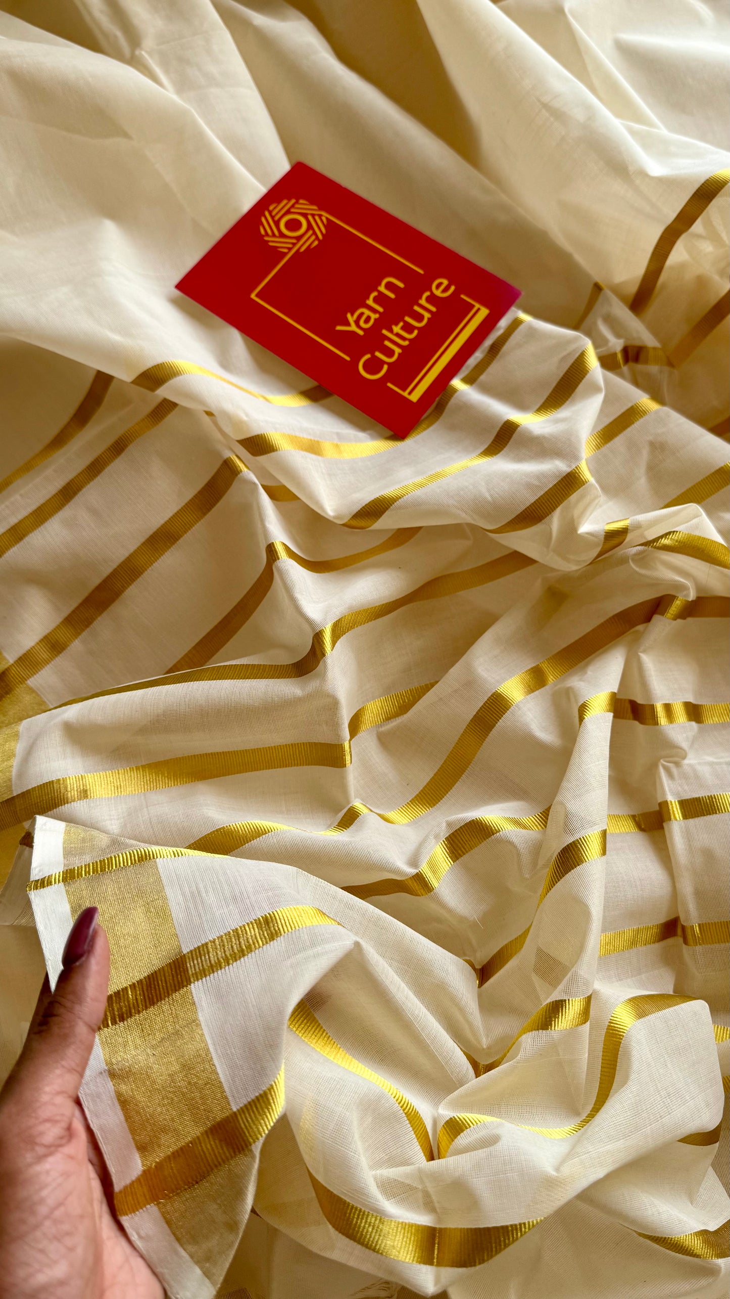 Handloom, woven in Chendamangalam Looms, ivory with gold striped pallu - YCIEON147