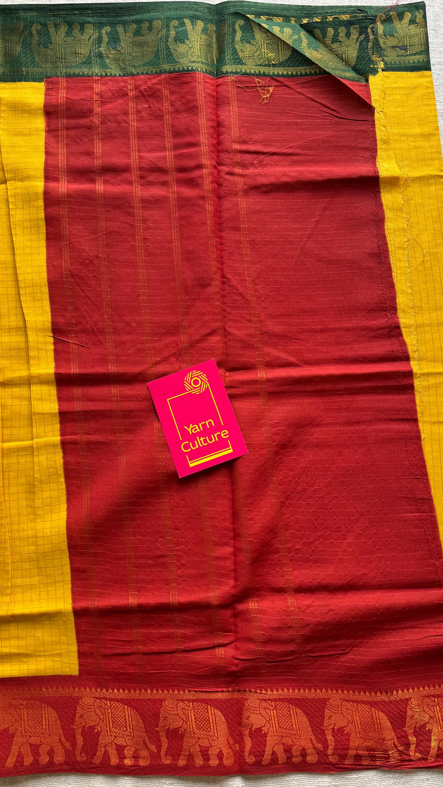 Sungudi cotton checks, yellow base, red and dark green border with elephant motifs, soft cotton - YCCOTNGJJA171