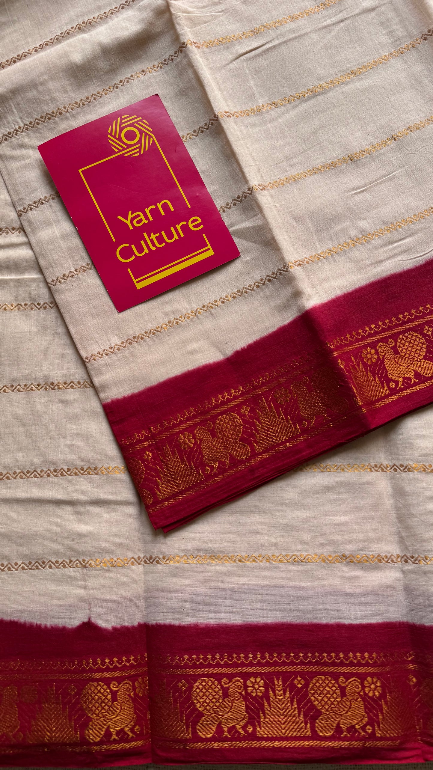 Cream velthaari patterned kattuchayam dyed madurai cotton saree with red peacock border - YCCOTNMSFE277