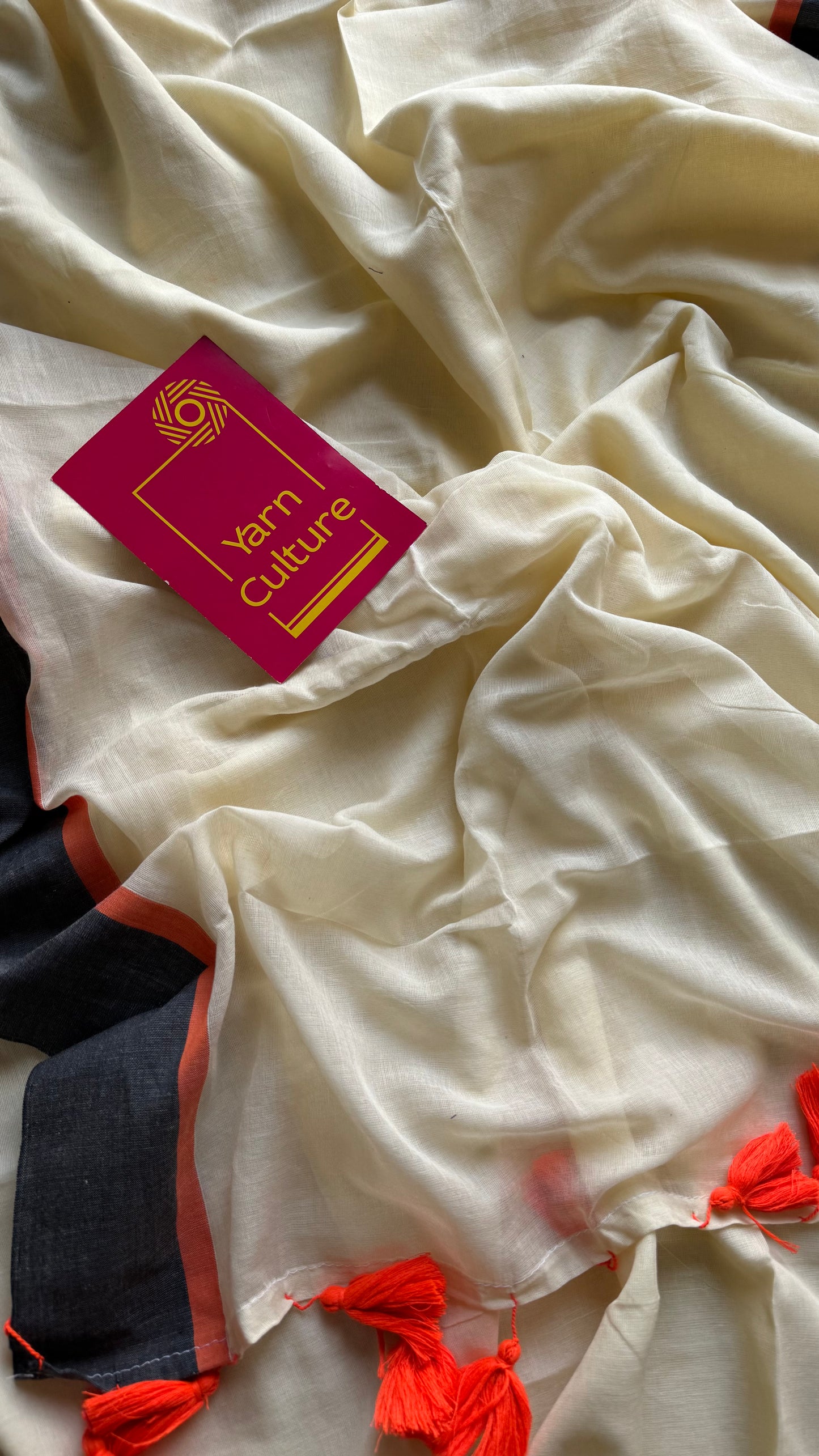 Ivory mul saree with black and orange border - YCBCMCFE293