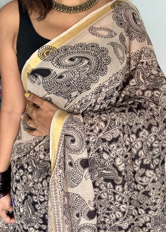 Black cream floral kalamkari saree in kota, with zari border - YCWOTDKKFE19