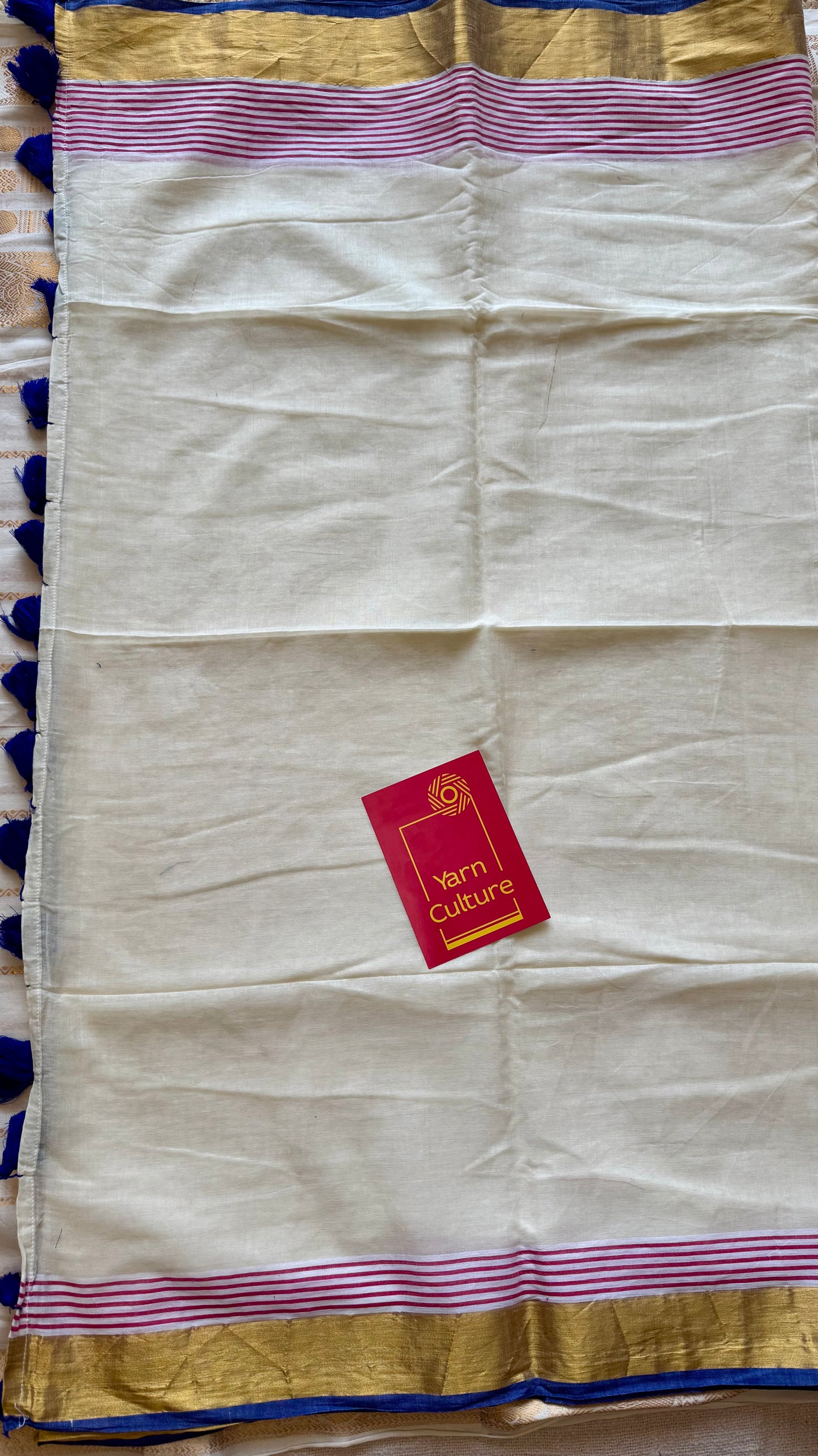 Ivory mul saree, blue and red striped border - YCIEON20