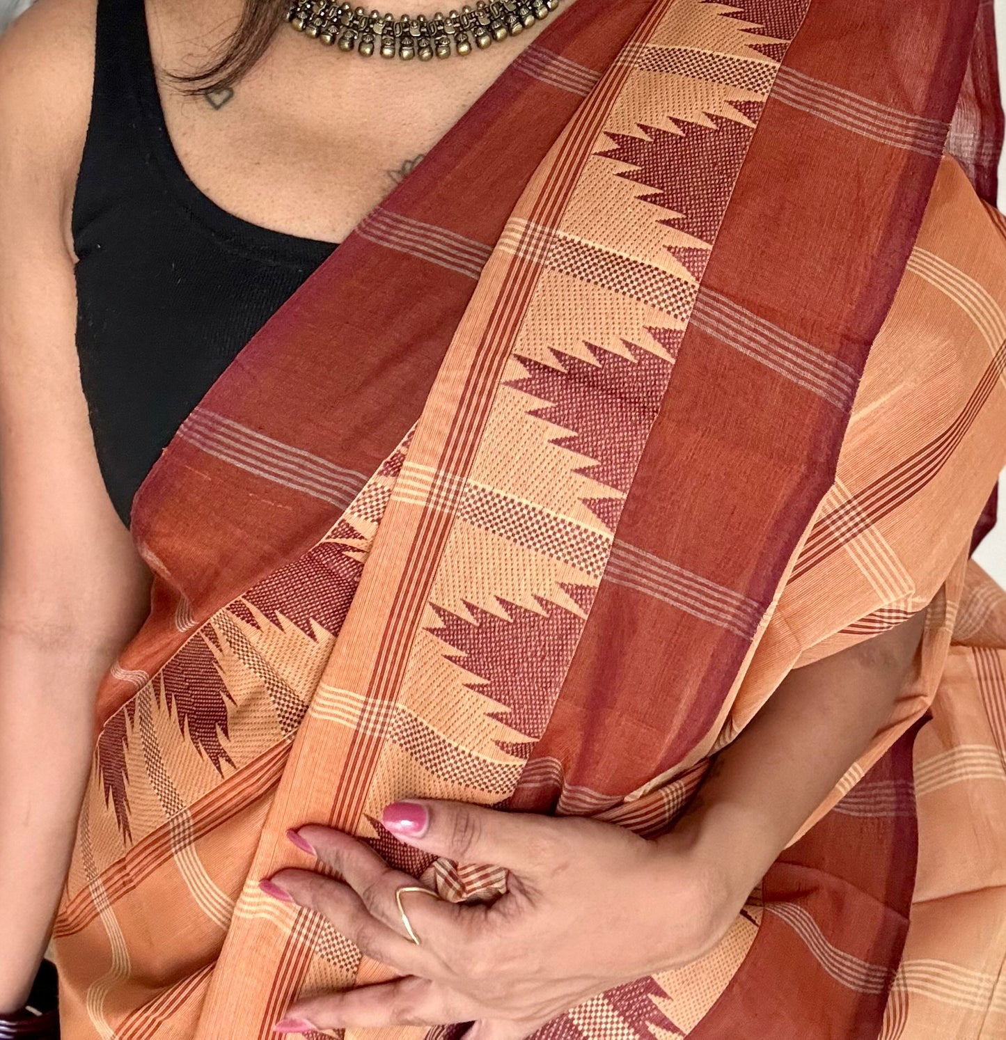 Chettinad cotton saree with light brown and dark brown checks, temple motif border - YCCOTNAP71