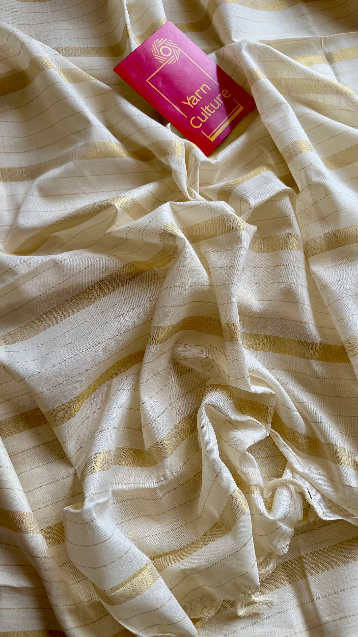 Ivory and gold kerala saree with gold stripes - YCIEON44