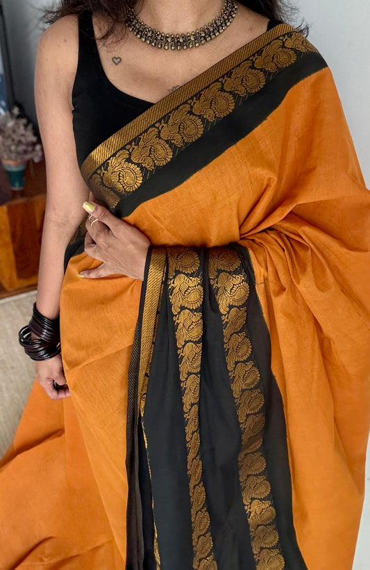 Dark turmeric and black sungudi with triple peacock motif rettai pettu wide border - YCCOTNSEMS46