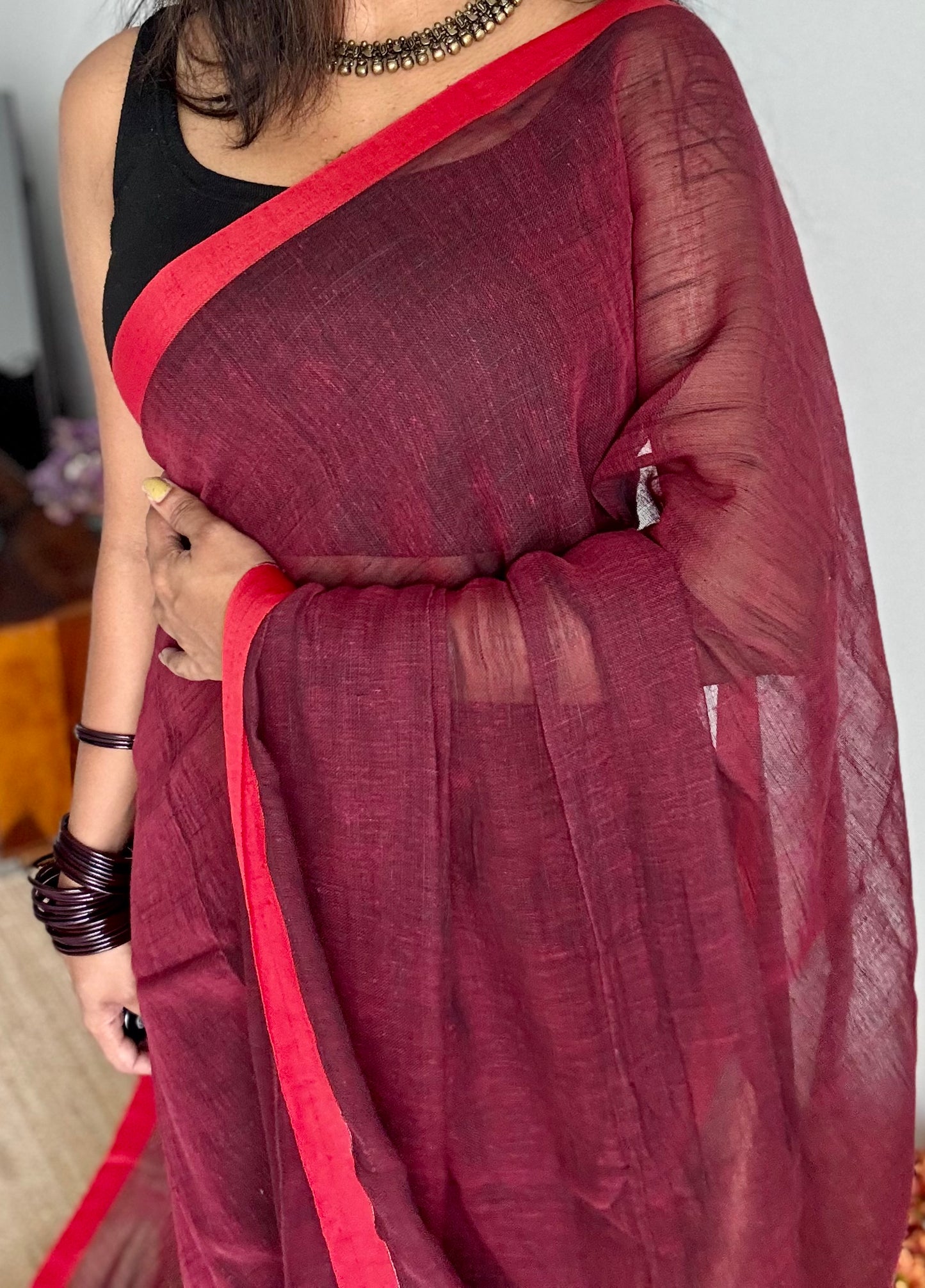 Maroon plain linen by cotton saree with copper zari pallu - YCBCLCFE398