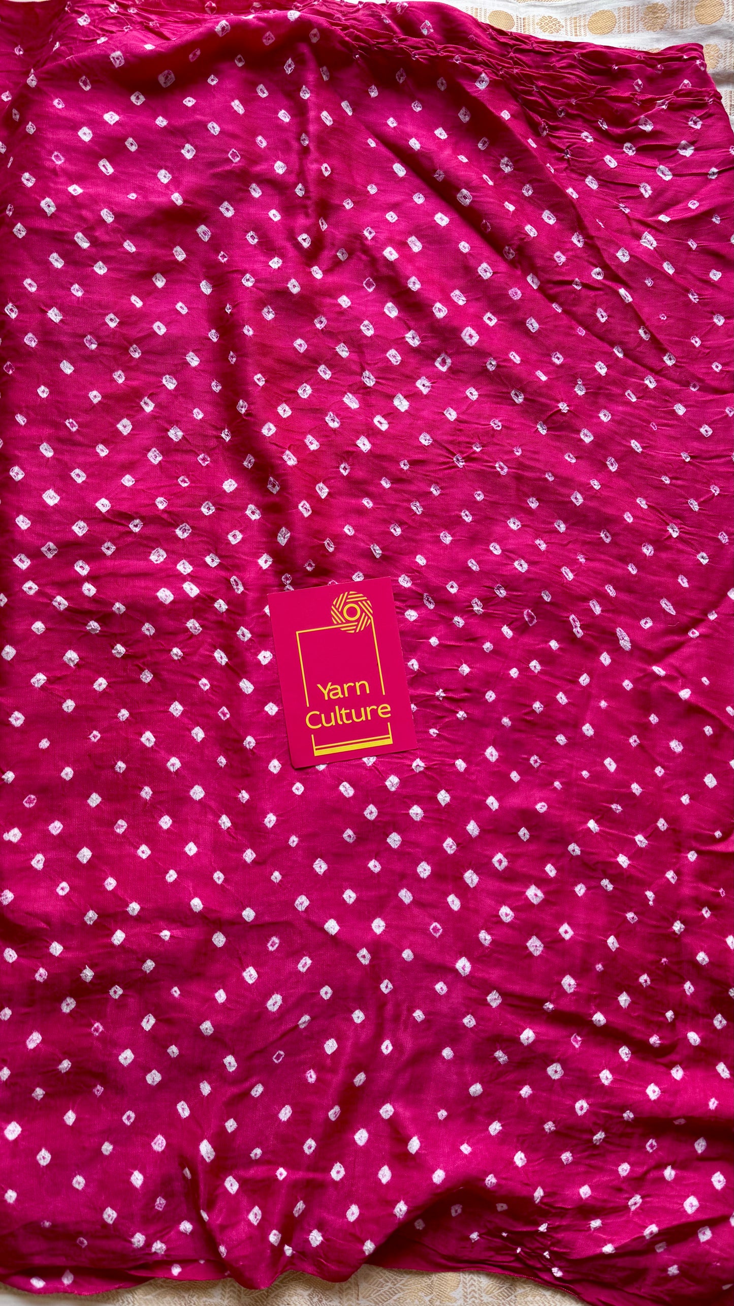 Rani pink, crushed bandhej pure modal silk saree with lagdi patta zari pallu - YCTOKBM332