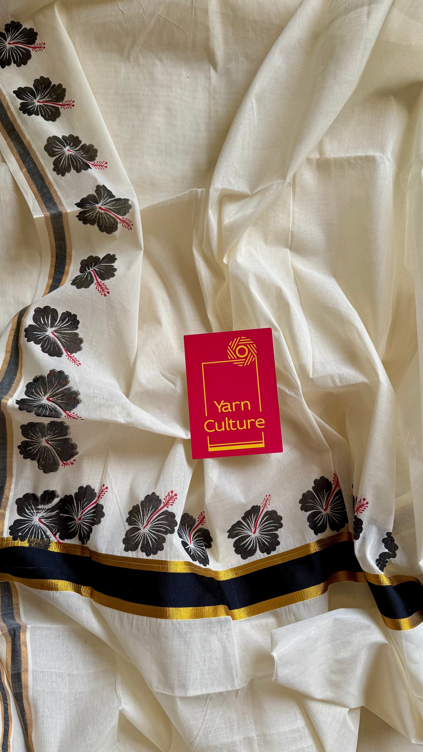 Ivory and gold soft cotton saree, black hibiscus (chembarathi) flowers - YCIEON61