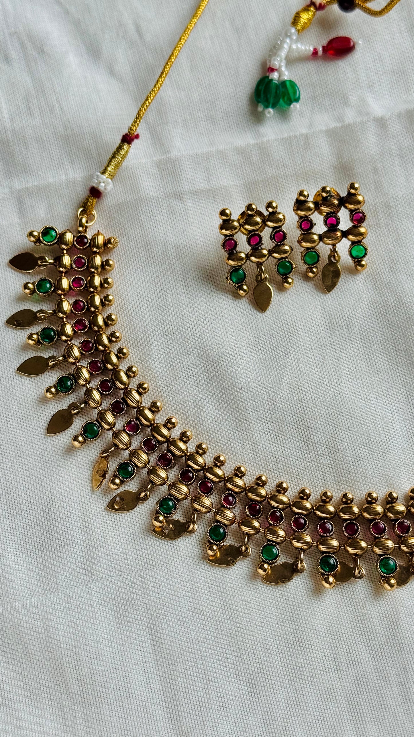 Elakkathali with ruby and green stones, with earrings - YCGPNP788