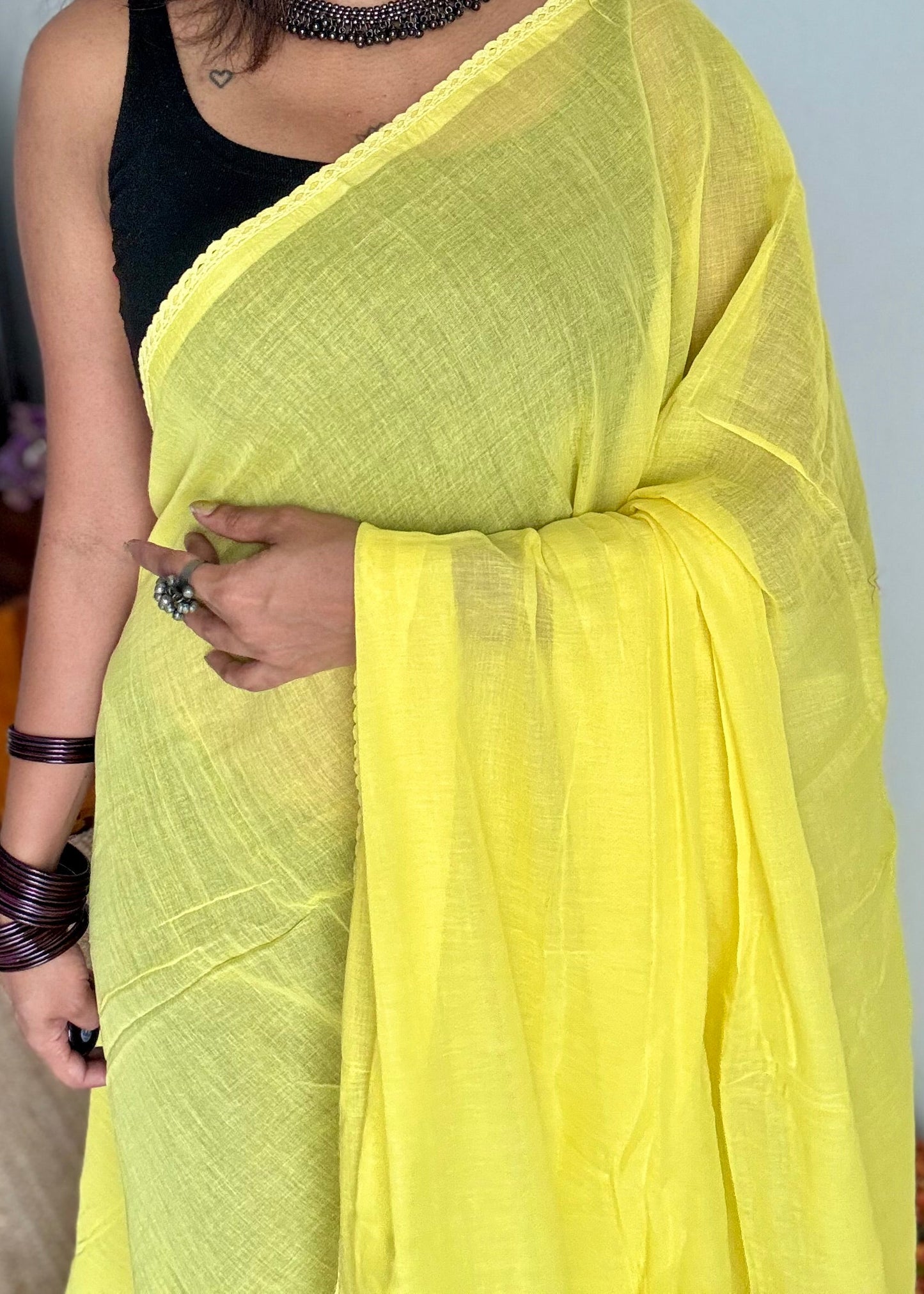 Yellow plain mul saree with lace border - YCBCMCFE402