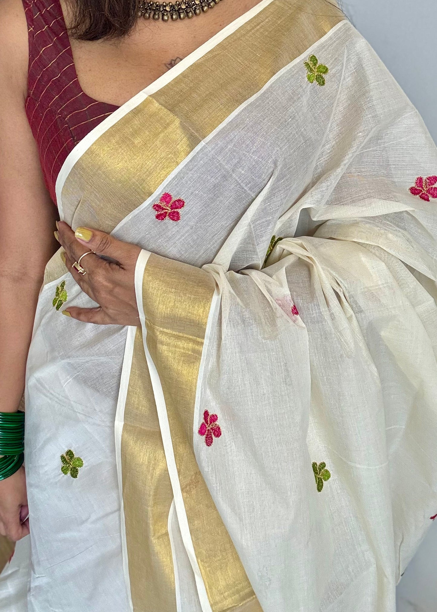 Ivory and gold saree with light green and hot pink floral embroidery - YCIEKCFE310