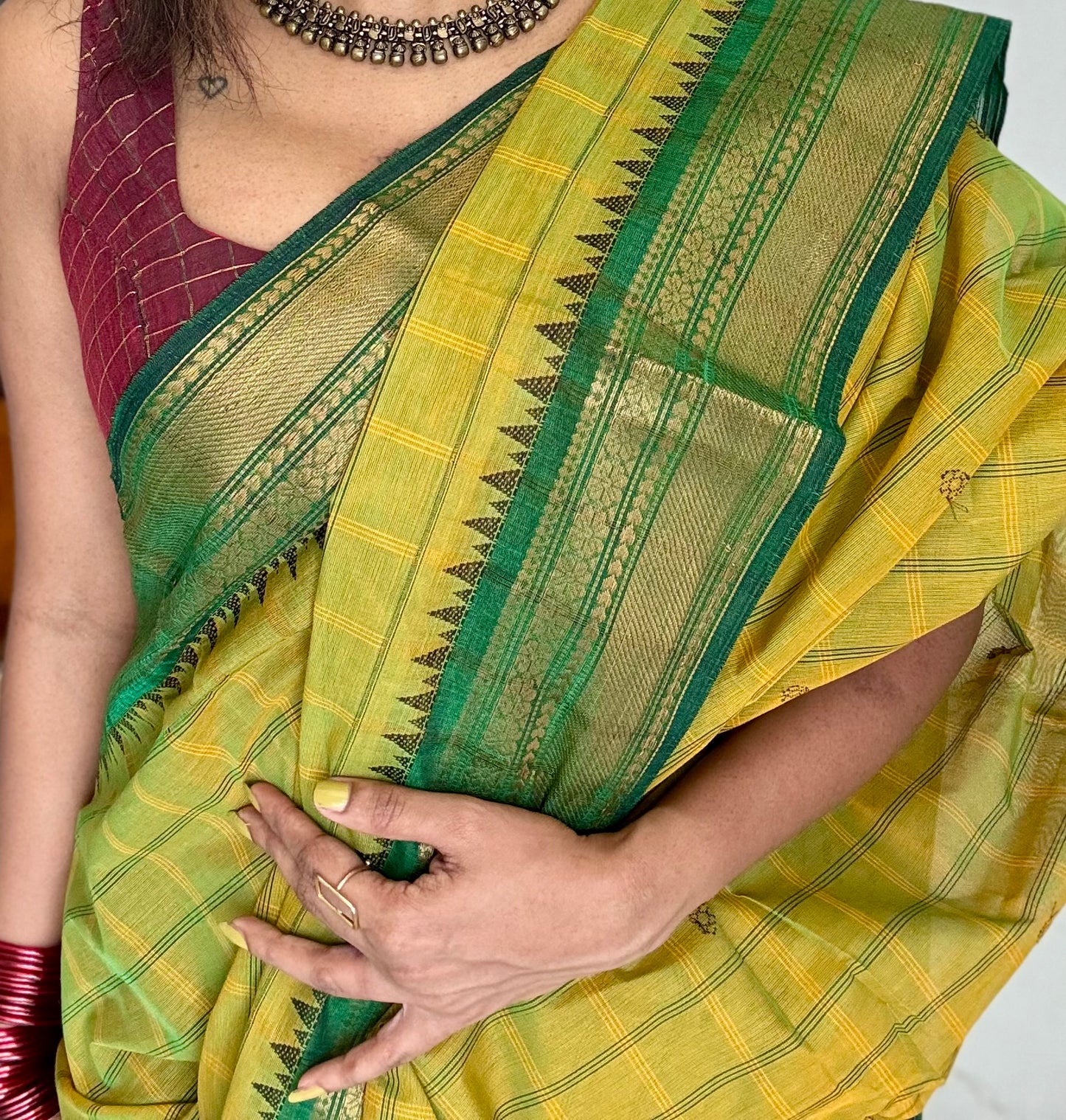 Light green Kanchi cotton saree with striped checks, woven buttas and dark green zari border - YCCOTNCCFE160