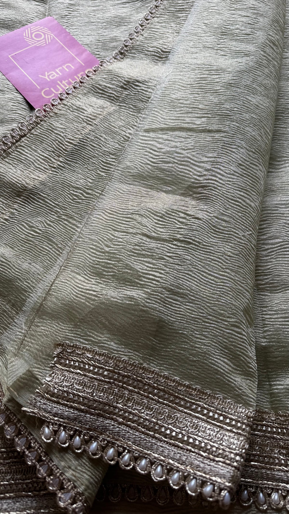 Pastel pista green crushed Banarasi tissue saree, with pearl lace border - YCBLTOC64
