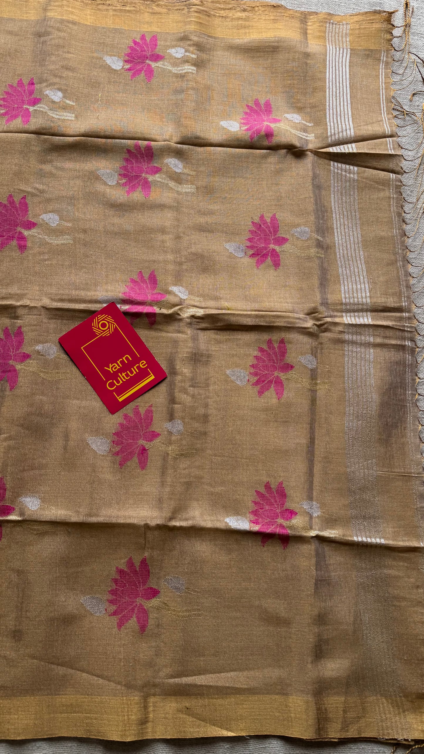 Handwoven ivory gold dual tone tissue linen saree with lotus motifs - YCBCLTFE400