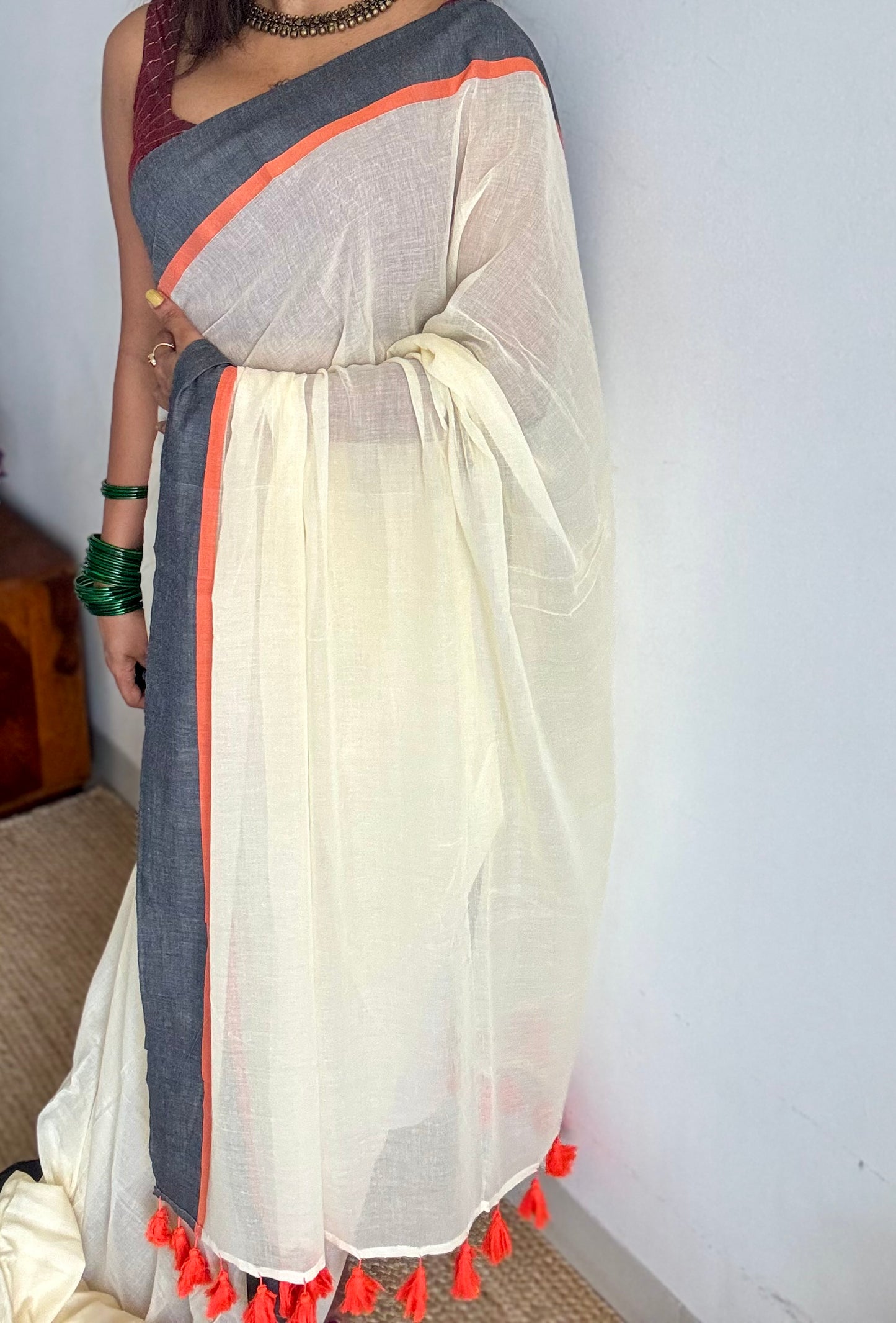 Ivory mul saree with black and orange border - YCBCMCFE293