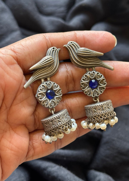 Bird Jhumka, blue stone, black polished oxidised silver - YCOSEJ451