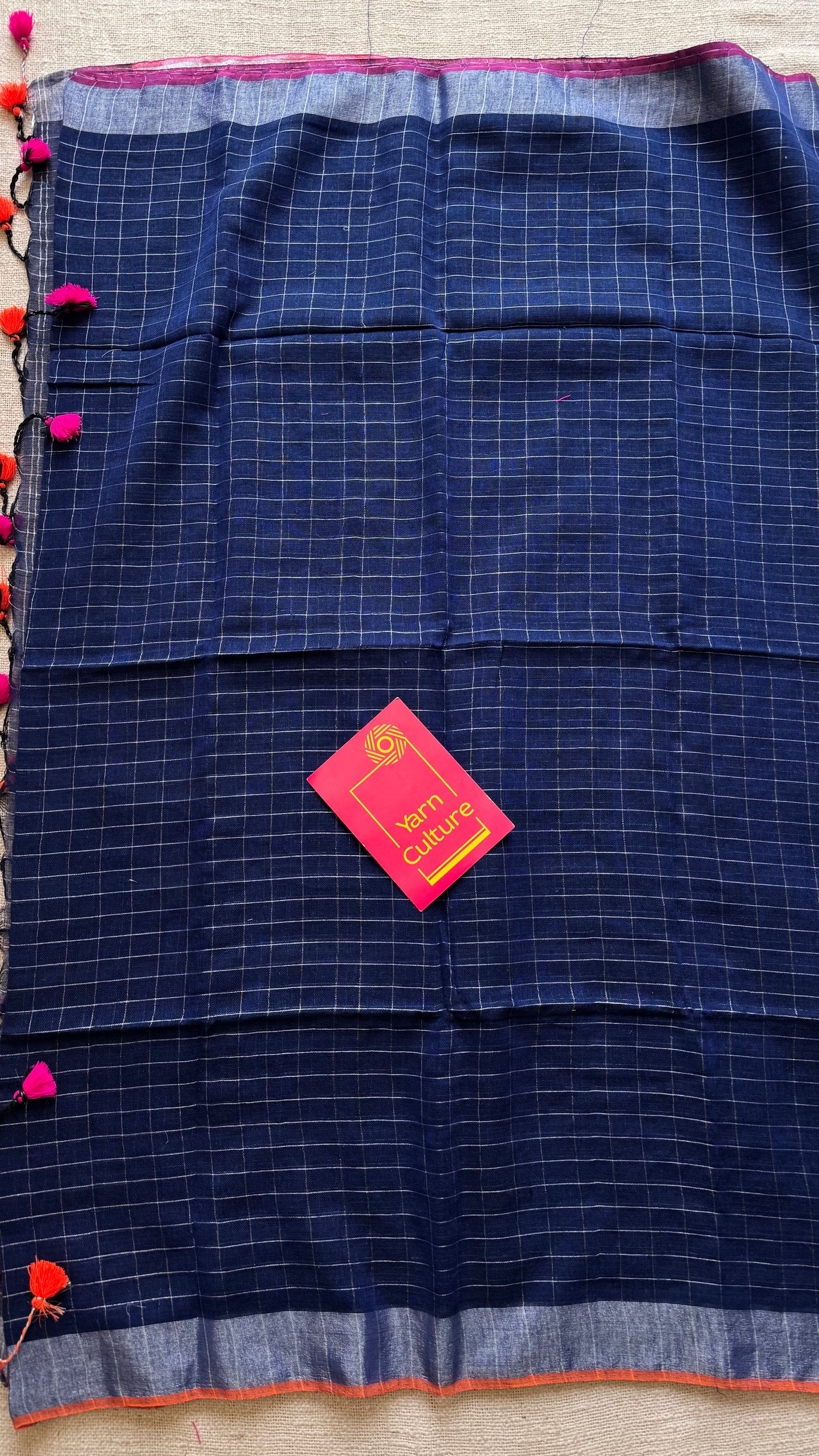 Navy blue linen by cotton saree, silver checks & zari pallu - YCBCLCFE392