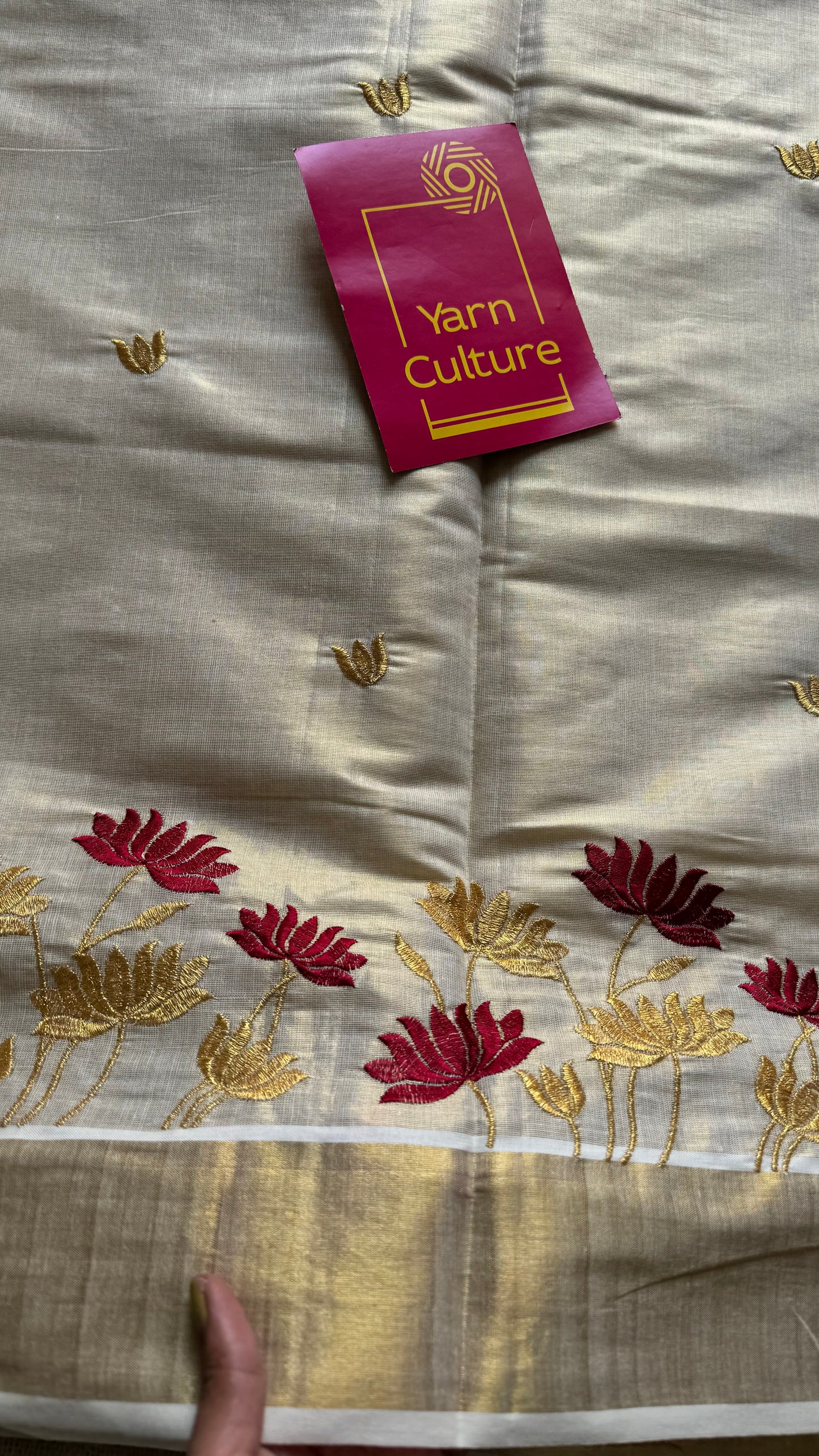 Ivory and gold tissue kerala cotton saree with maroon and gold lotus embroidery - YCIEKCFE316