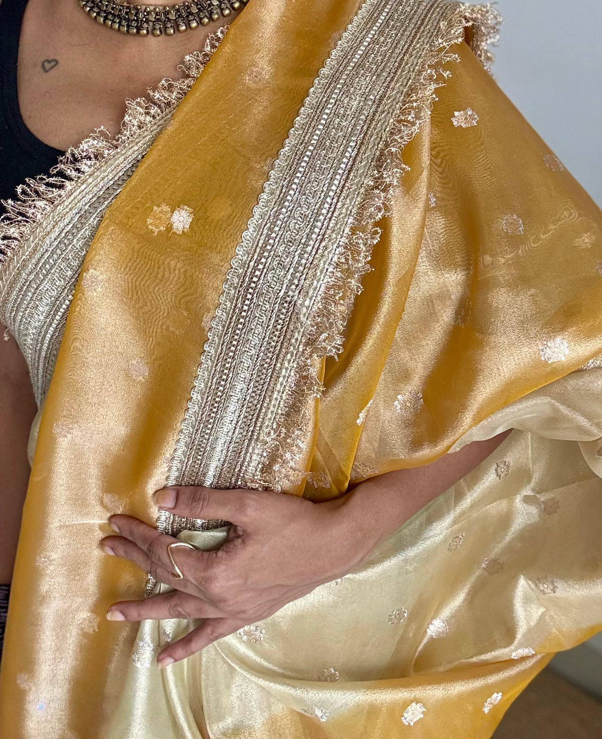 Light gold and dark gold Banarasi tissue saree, with buttas and embellished lace border - YCBLTOC65