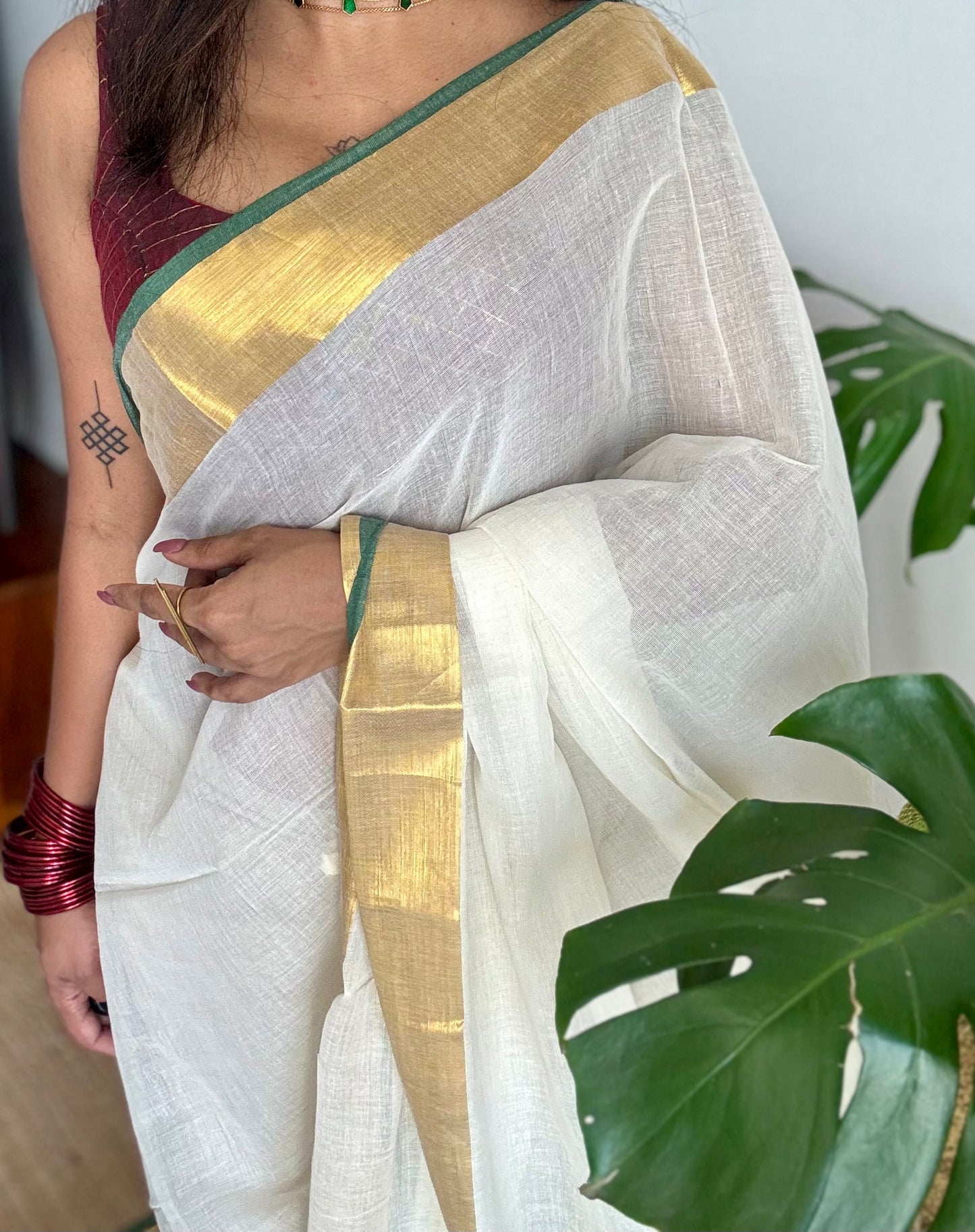 Ivory mul saree, green and gold border -YCIEON16
