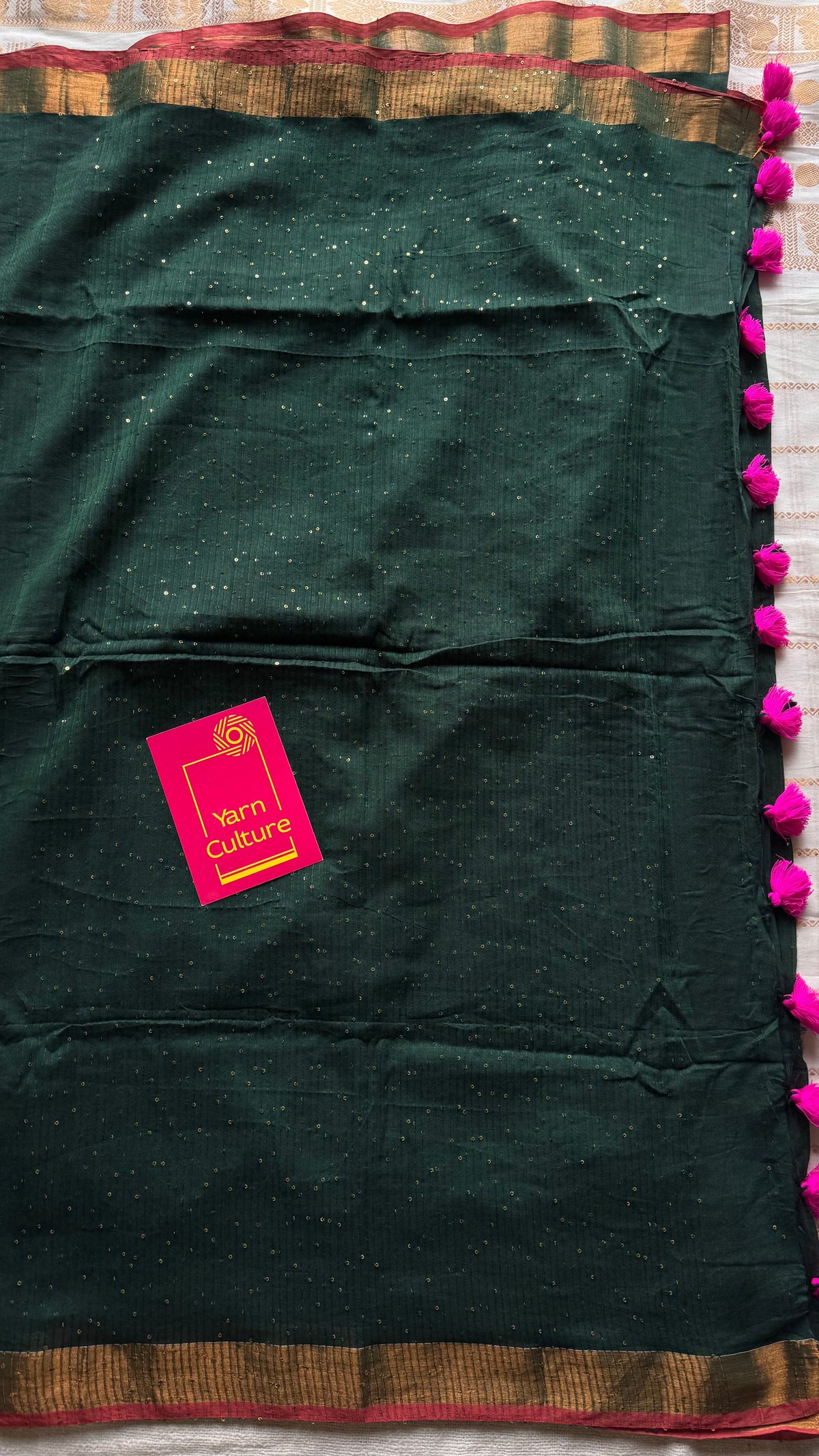 Dark green mul cotton saree with sequins and zari border - YCBCMCSE32