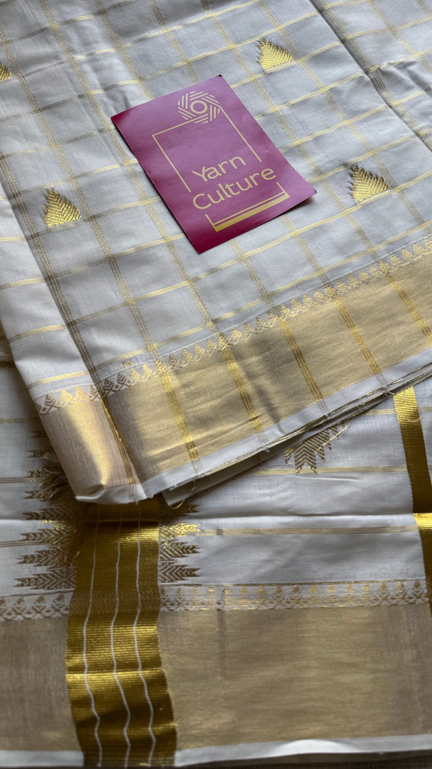 Ivory Kerala cotton saree with checks and gold jacquard motifs - YCIEKCFE319