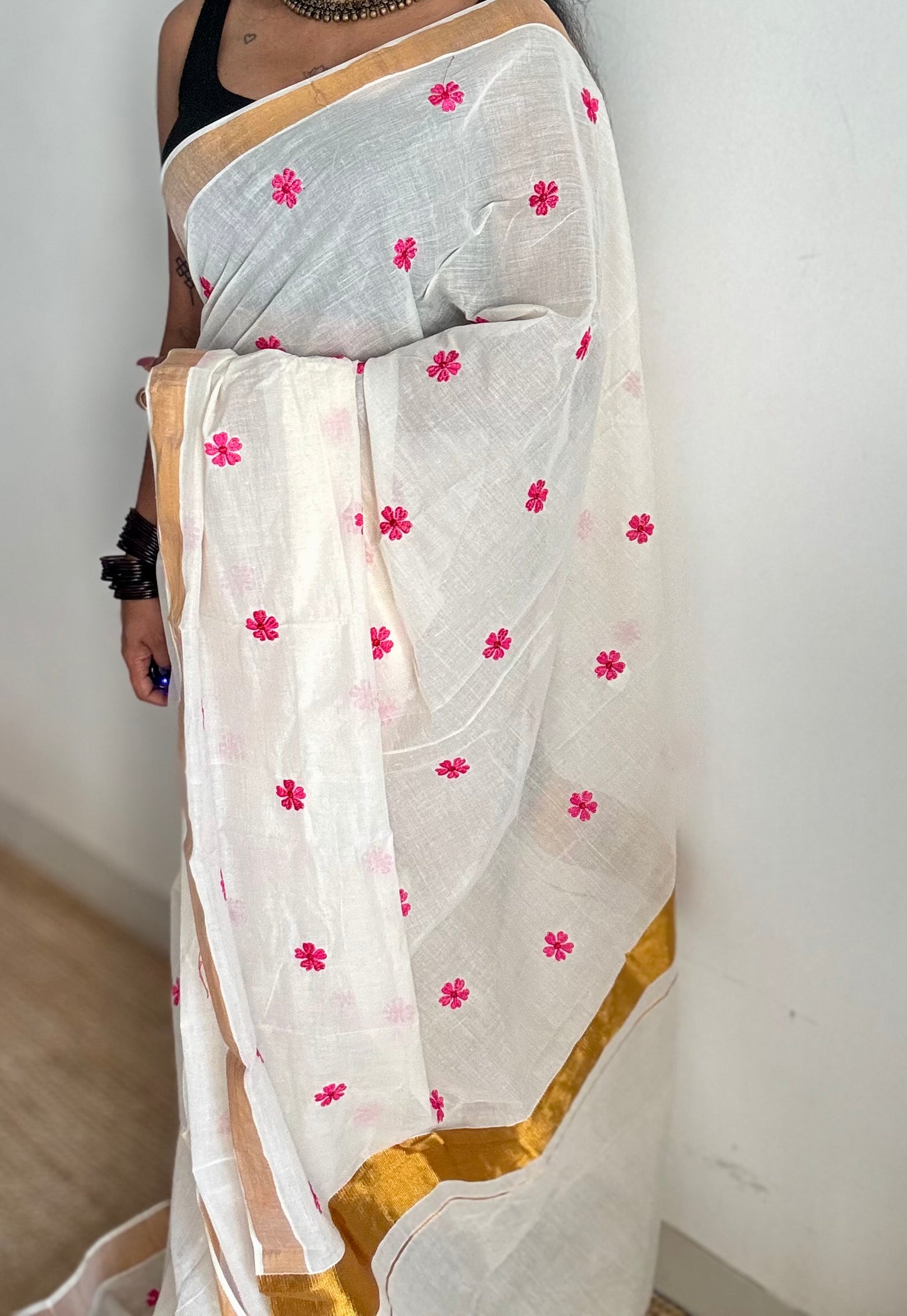 Ivory and antique gold soft cotton kasavu saree, pink parijat floral embroidery - YCIEON155