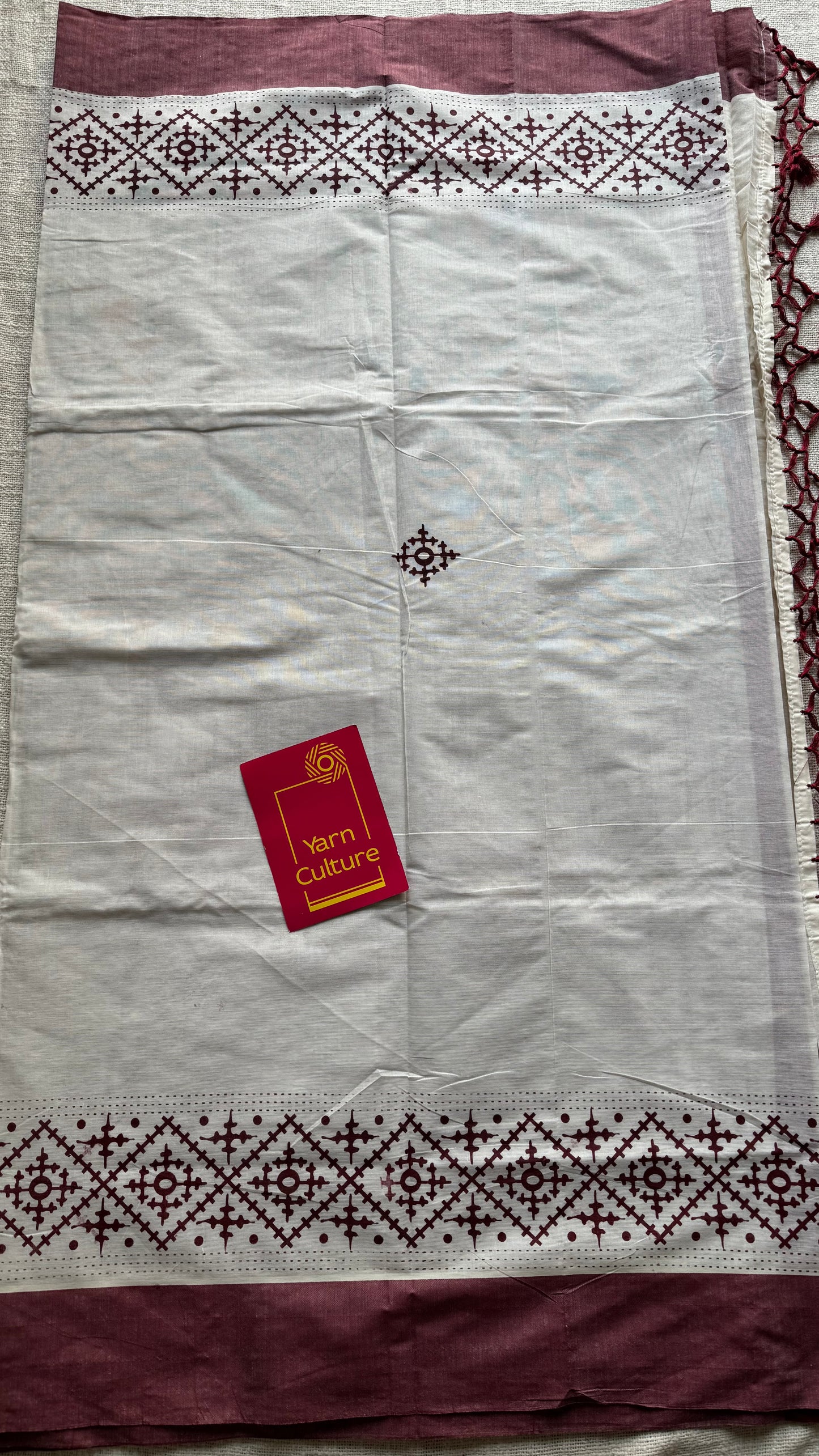 Ivory Kerala cotton saree with maroon Kutch-inspired printed borders and maroon centre pleats - YCIEKCFE313