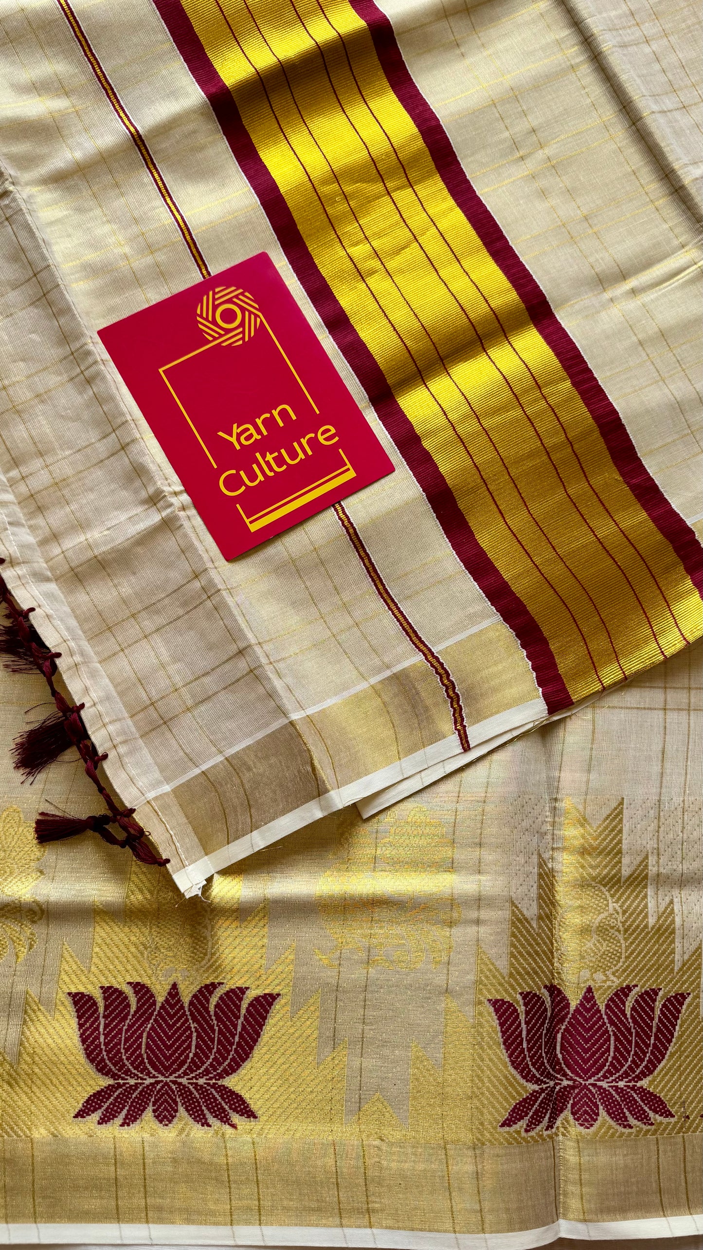 Ivory and gold kerala kasavu saree, maroon lotus motif border - YCIEON48