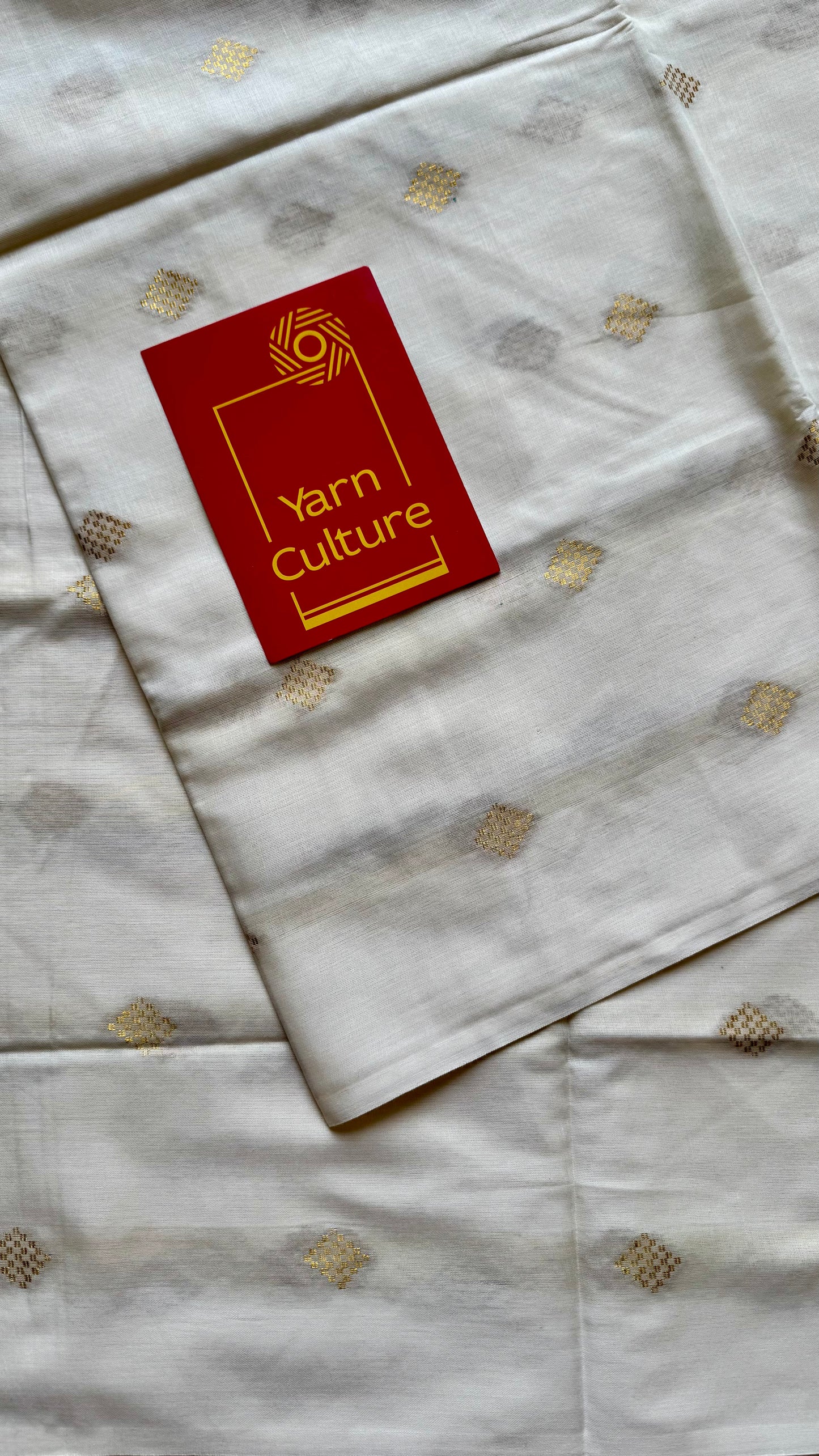 Ivory and gold kerala saree with woven buttas - YCIEON42