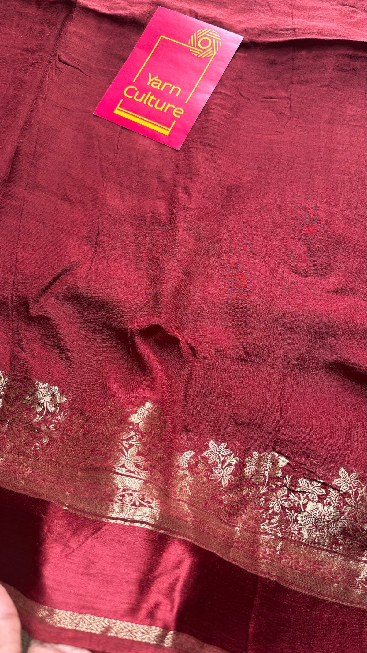 Maroon, semi crepe silk saree with antique gold floral border - YCLOKOC52